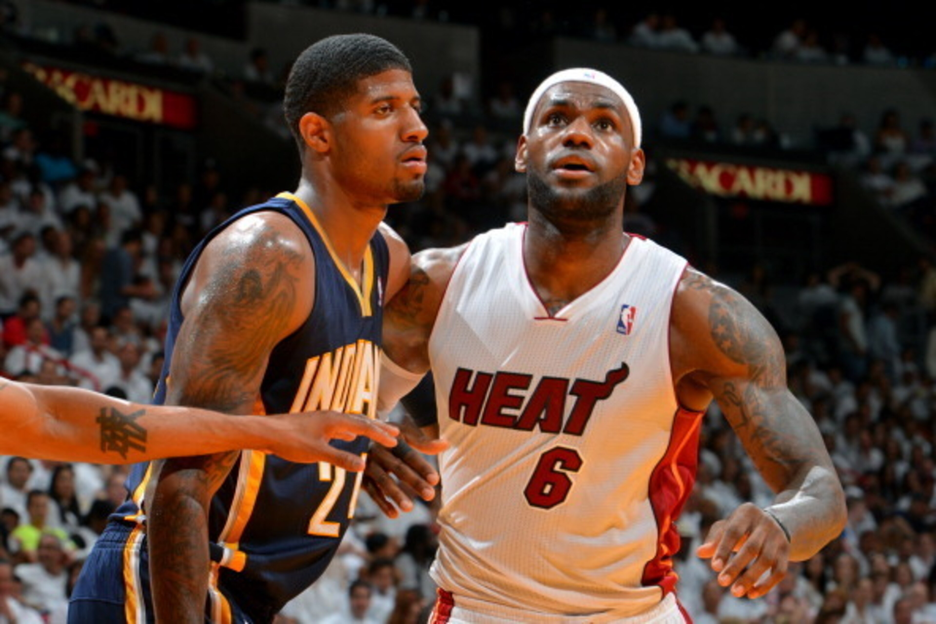MIAMI, FL - MAY 26: Paul George #24 of the Indiana Pacers battles for position against LeBron James #6 of the Miami Heat in Game Four of the Eastern Conference Semifinals during the 2014 NBA Playoffs on May 26, 2014 at American Airlines Arena in Miami, Fl