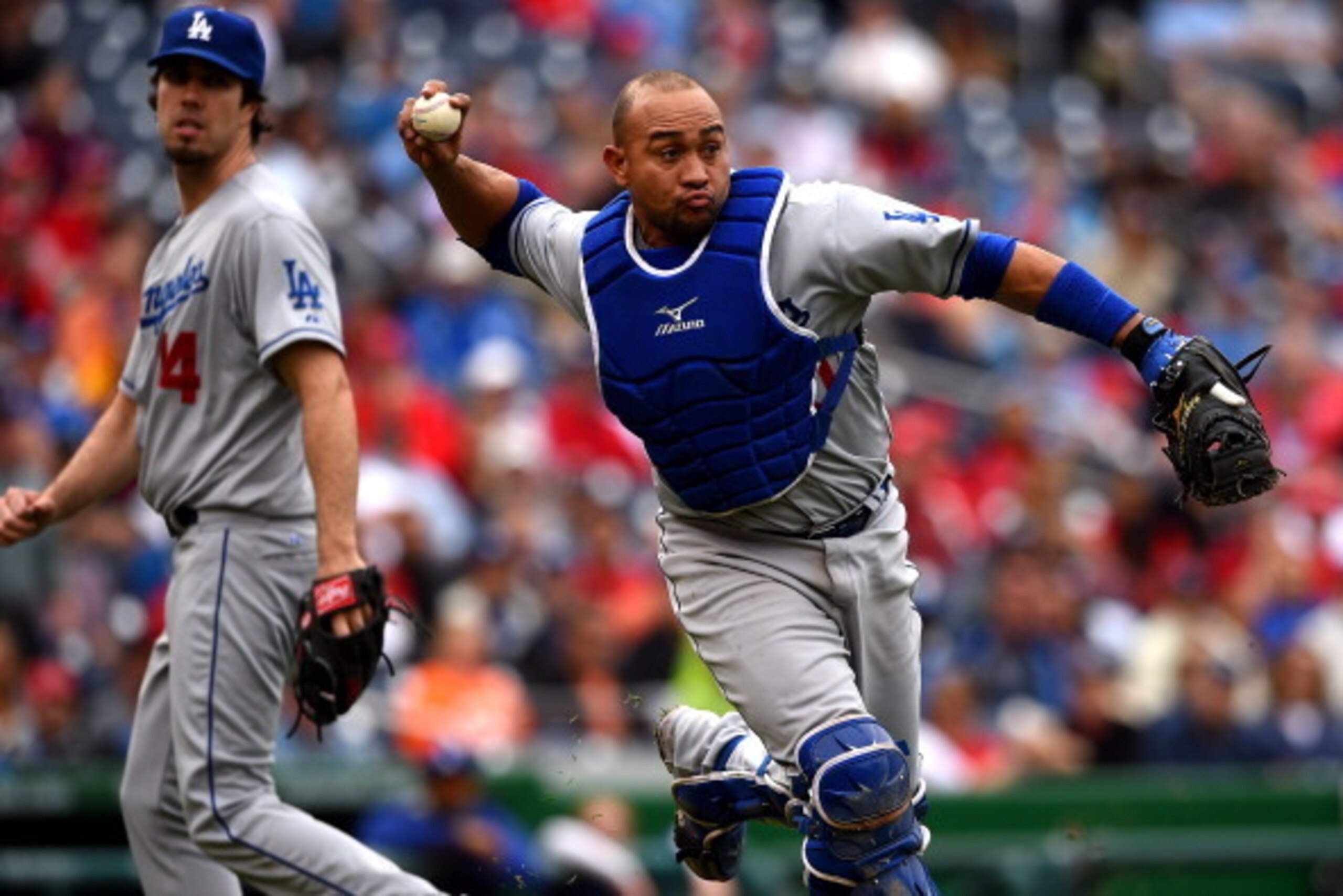 WASHINGTON, DC - MAY 07: Catcher Miguel Olivo #30 of the Los Angeles Dodgers makes an out on Stephen Strasburg #37 of the Washington Nationals (not pictured) in the sixth inning at Nationals Park on May 7, 2014 in Washington, DC. The Washington Nationals 