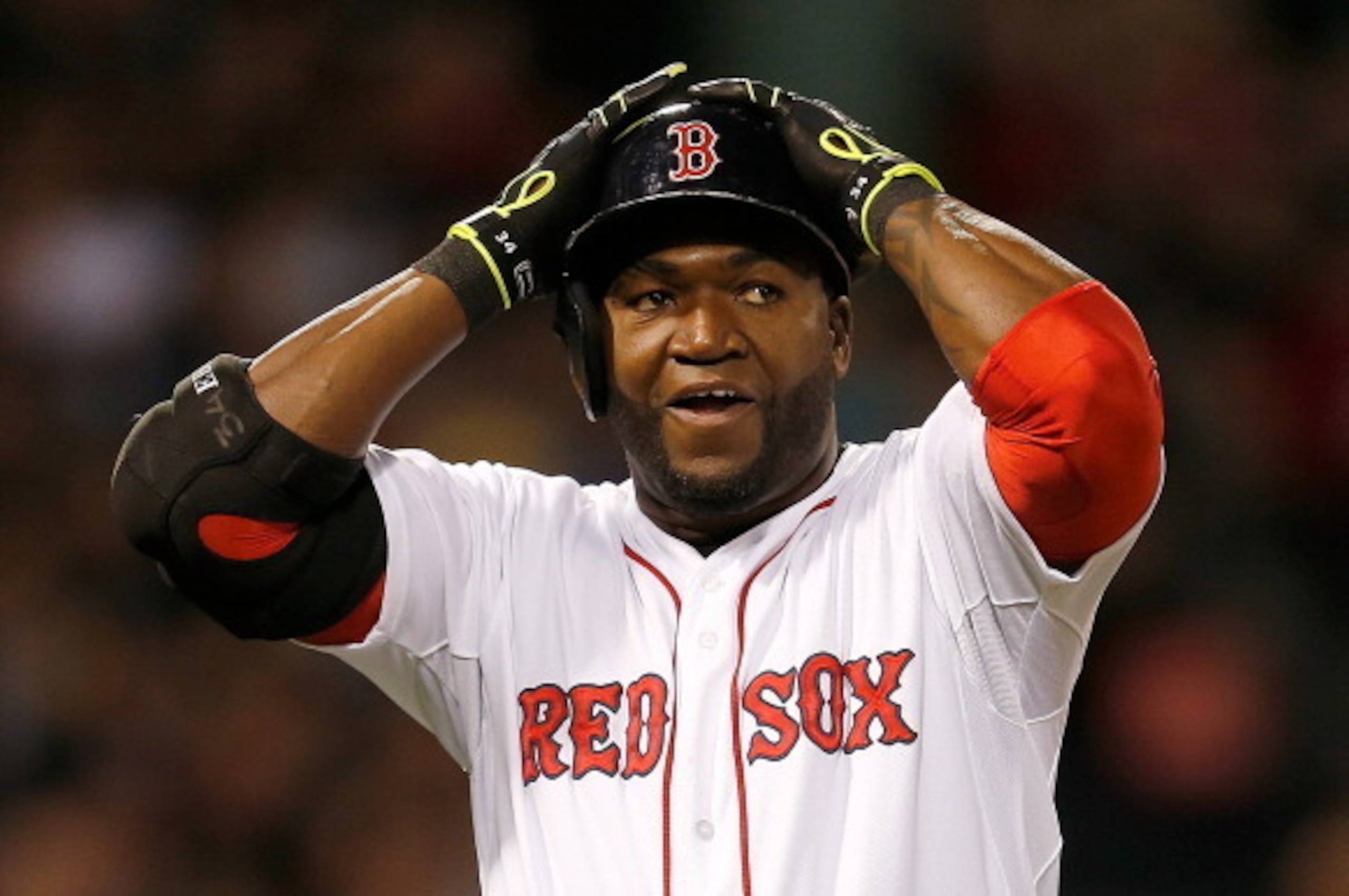 BOSTON, MA - MAY 21:  David Ortiz #34 of the Boston Red Sox reacts after popping out with a man on base in the fifth inning during a game with the Toronto Blue Jays at Fenway Park on May 21, 2014 in Boston, Massachusetts.  (Photo by Jim Rogash/Getty Image