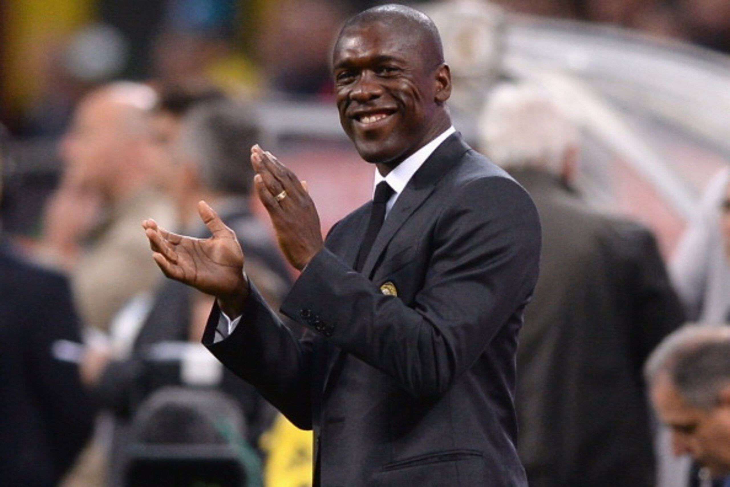 MILAN, ITALY - MAY 18:  Head coach AC Milan Clarence Seedorf smiles during the Serie A match between AC Milan and US Sassuolo Calcio at San Siro Stadium on May 18, 2014 in Milan, Italy.  (Photo by Claudio Villa/Getty Images)