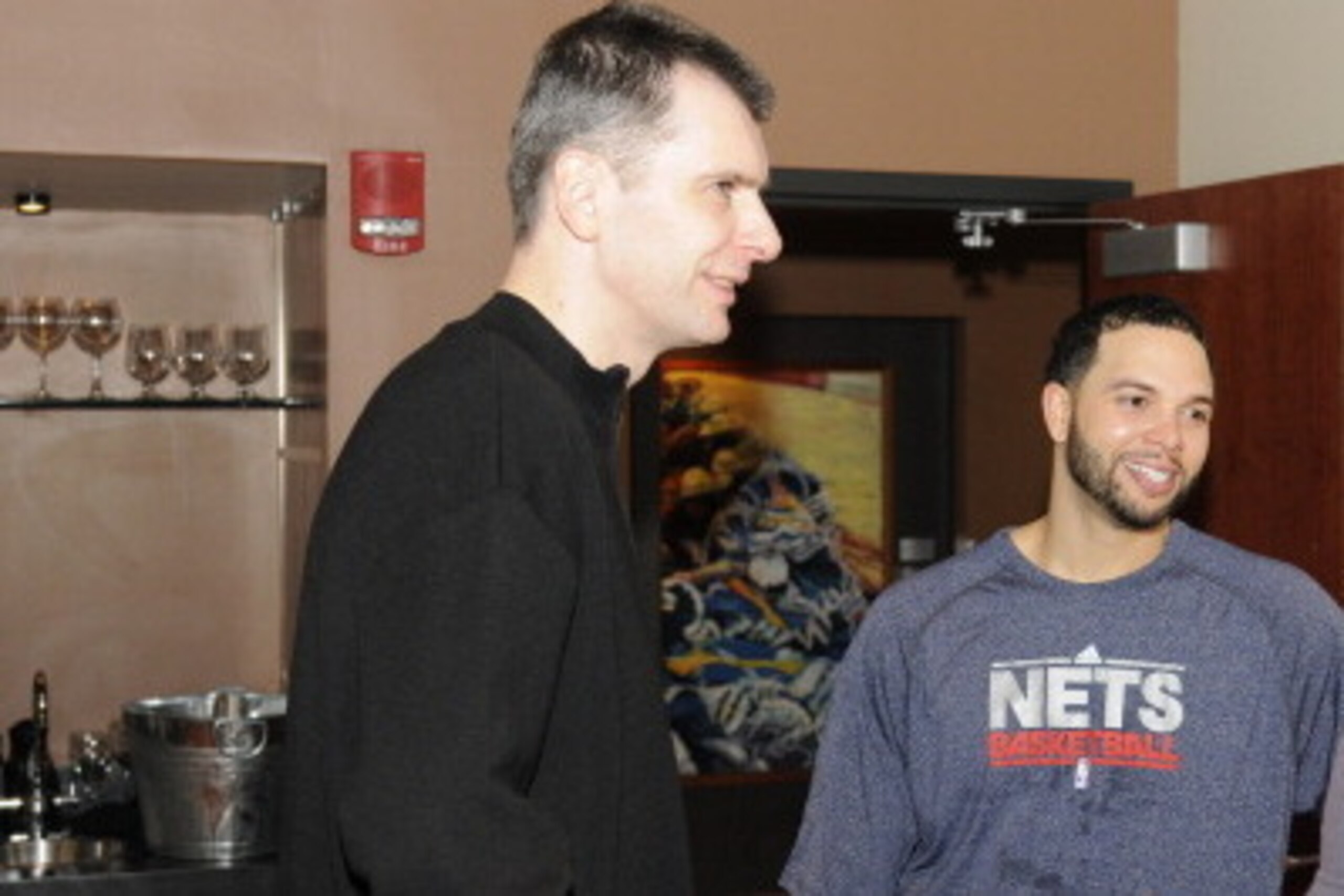 SAN ANTONIO, TX - FEBRUARY 25:  New Jersey Nets owner Mikhail Prokhorov meets with Deron Williams following the game against the San Antonio Spurs at AT&T Center on February 25, 2011 in San Antonio, Texas. NOTE TO USER: User expressly acknowledges and agr