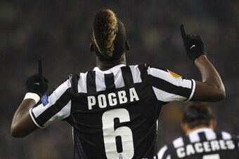 TURIN, ITALY - FEBRUARY 20:  Paul Pogba of Juventus FC celebrates after scoring their second goal during the UEFA Europa League Round of 32 match between Juventus and AS Trabzonspor at Juventus Arena on February 20, 2014 in Turin, Italy.  (Photo by Marco 