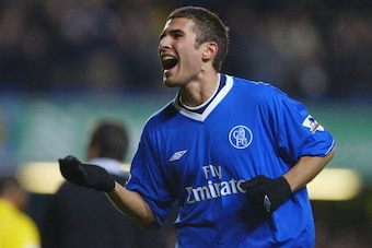 LONDON - JANUARY 14:  Adrian Mutu of Chelsea celebrates scoring their third goal during the FA Cup Third round replay between Chelsea and Watford at Stamford Bridge on January 14, 2004 in London.  (Photo by Phil Cole/Getty Images)