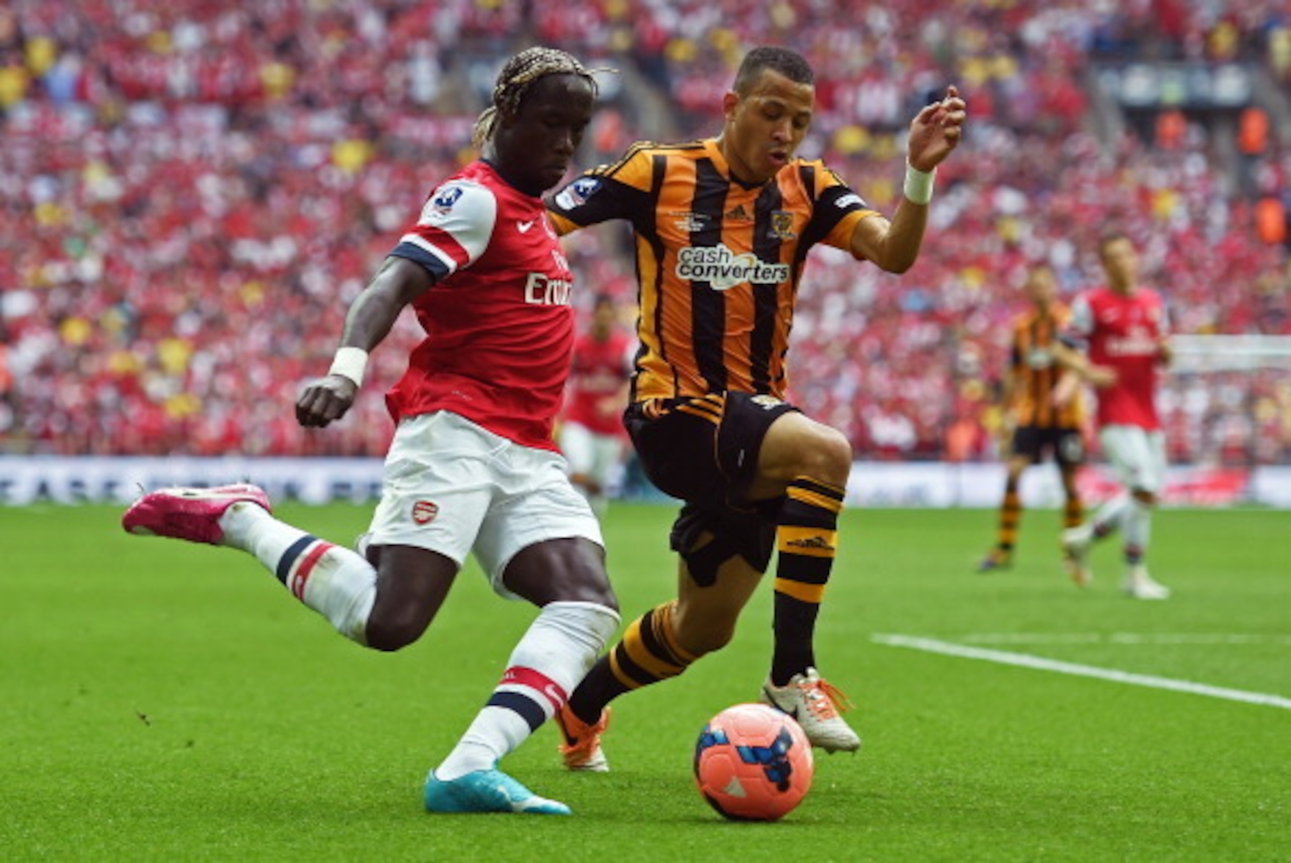 LONDON, ENGLAND - MAY 17: Bacary Sagna of Arsenal takes on Liam Rosenior of Hull City during the FA Cup with Budweiser Final match between Arsenal and Hull City at Wembley Stadium on May 17, 2014 in London, England. (Photo by Shaun Botterill/Getty Image LONDON, ENGLAND - MAY 17: Bacary Sagna of Arsenal takes on Liam Rosenior of Hull City during the FA Cup with Budweiser Final match between Arsenal and Hull City at Wembley Stadium on May 17, 2014 in London, England. (Photo by Shaun Botterill/Getty Image