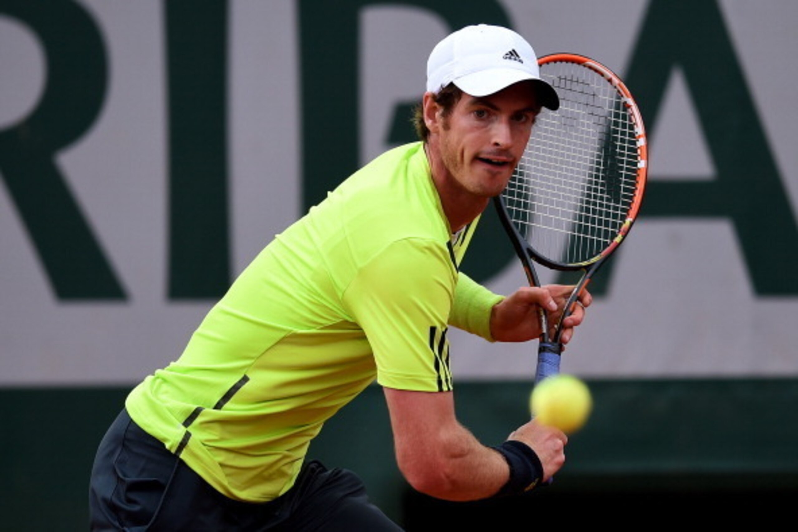 PARIS, FRANCE - MAY 27:  Andy Murray of Great Britain returns a shot during his men's singles match against Andrey Golubev of Kazakhstan on day three of the French Open at Roland Garros on May 27, 2014 in Paris, France.  (Photo by Matthias Hangst/Getty Im