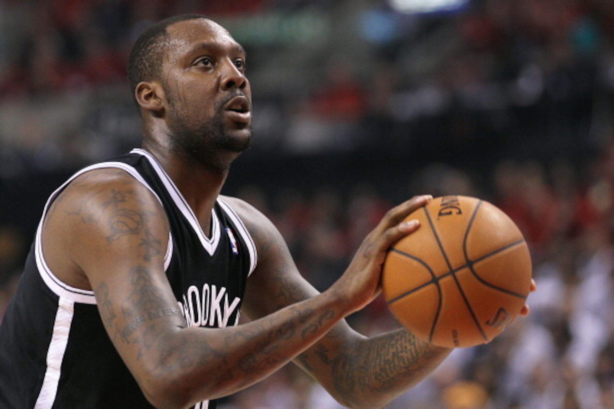 TORONTO, ON - MAY 4:  Andray Blatche #0 of the Brooklyn Nets gets set to take a free throw against the Toronto Raptors in Game Seven of the NBA Eastern Conference Quarterfinals at the Air Canada Centre on May 4, 2014 in Toronto, Ontario, Canada. The Nets 