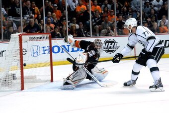ANAHEIM, CA - MAY 16: Jeff Carter #77 of the Los Angeles Kings shoots against John Gibson #36 of the Anaheim Ducks in Game Seven of the Second Round of the 2014 Stanley Cup Playoffs at Honda Center on May 16, 2014 in Anaheim, California. (Photo by Andrew 