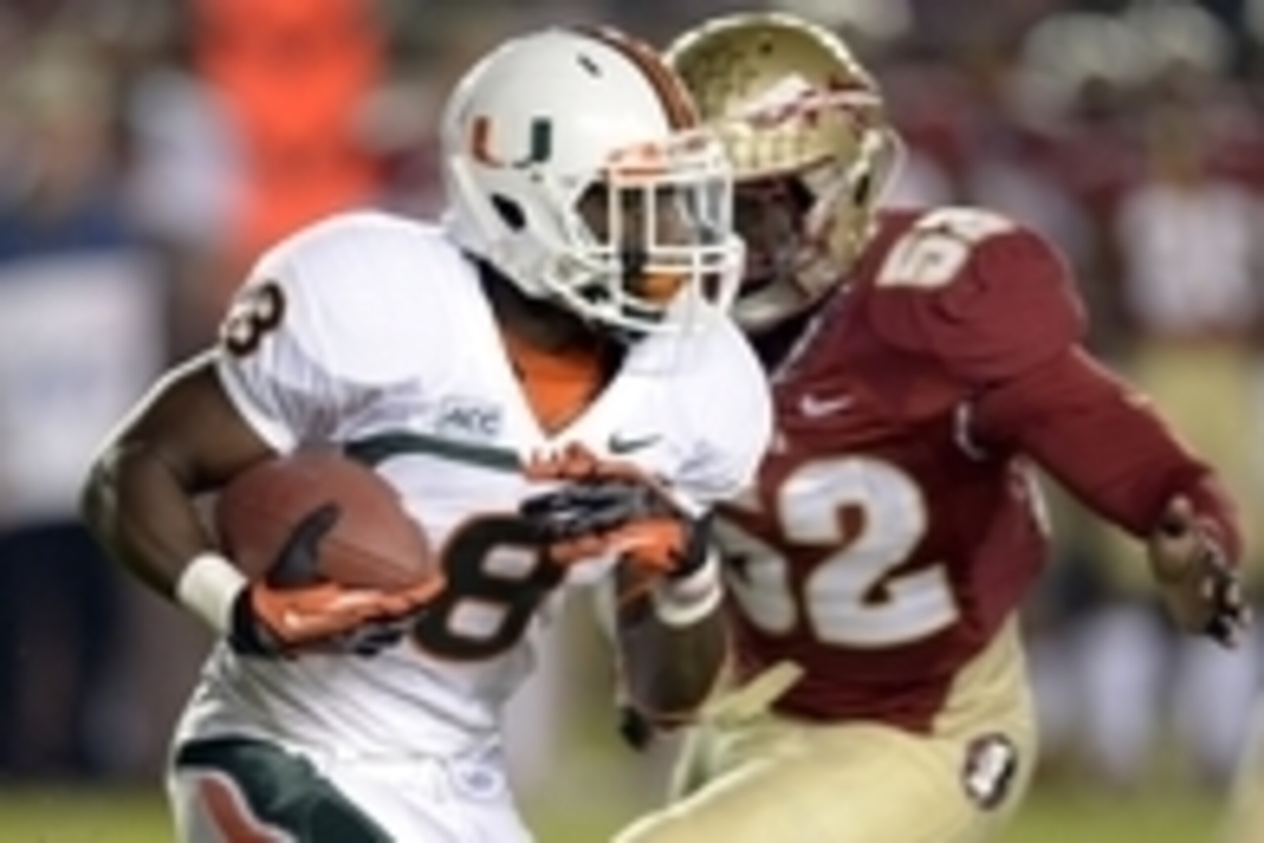 Nov 2, 2013; Tallahassee, FL, USA; Miami Hurricanes running back Duke Johnson (8) carries against the Florida State Seminoles during the first quarter at Doak Campbell Stadium. Mandatory Credit: John David Mercer-USA TODAY Sports