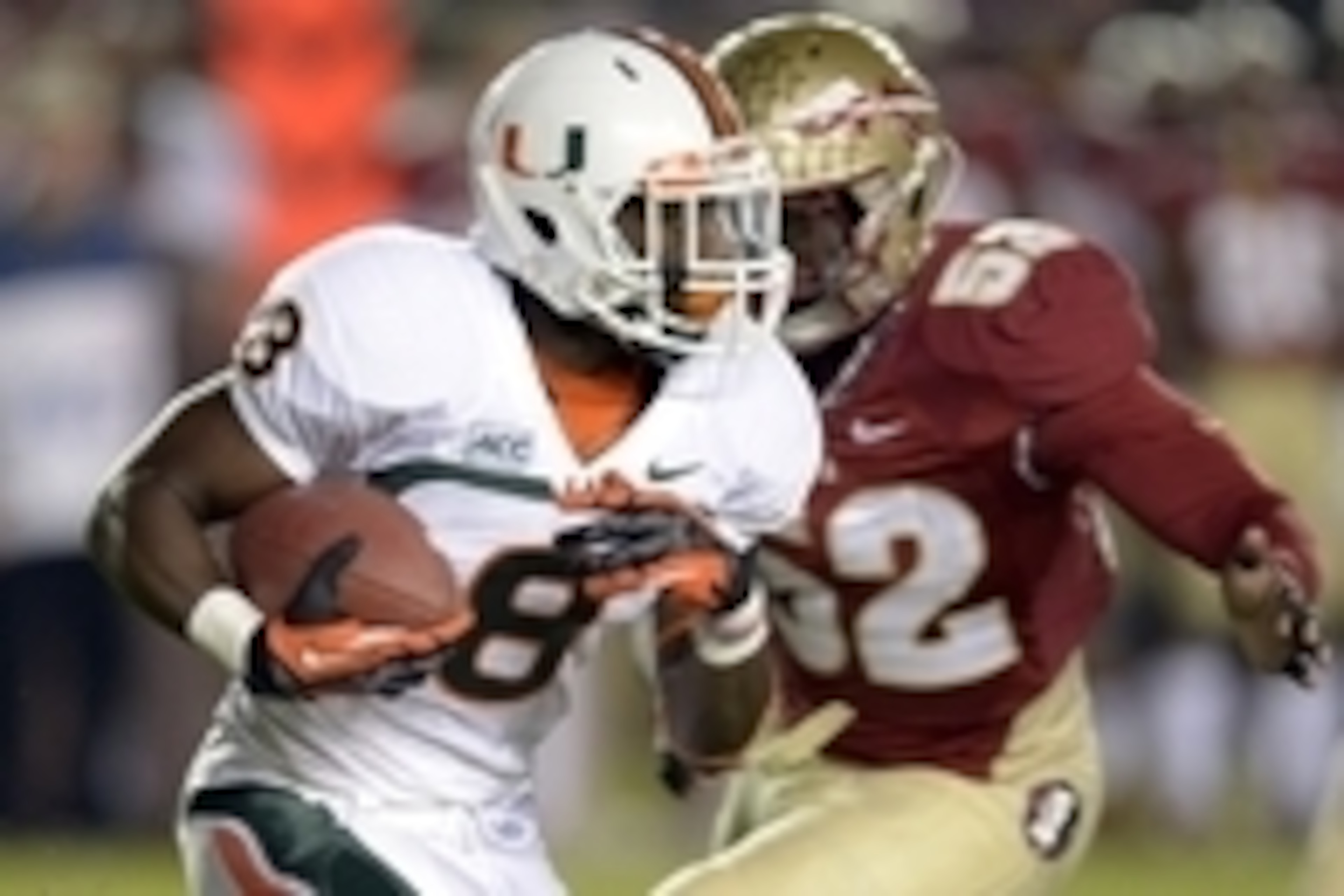 Nov 2, 2013; Tallahassee, FL, USA; Miami Hurricanes running back Duke Johnson (8) carries against the Florida State Seminoles during the first quarter at Doak Campbell Stadium. Mandatory Credit: John David Mercer-USA TODAY Sports