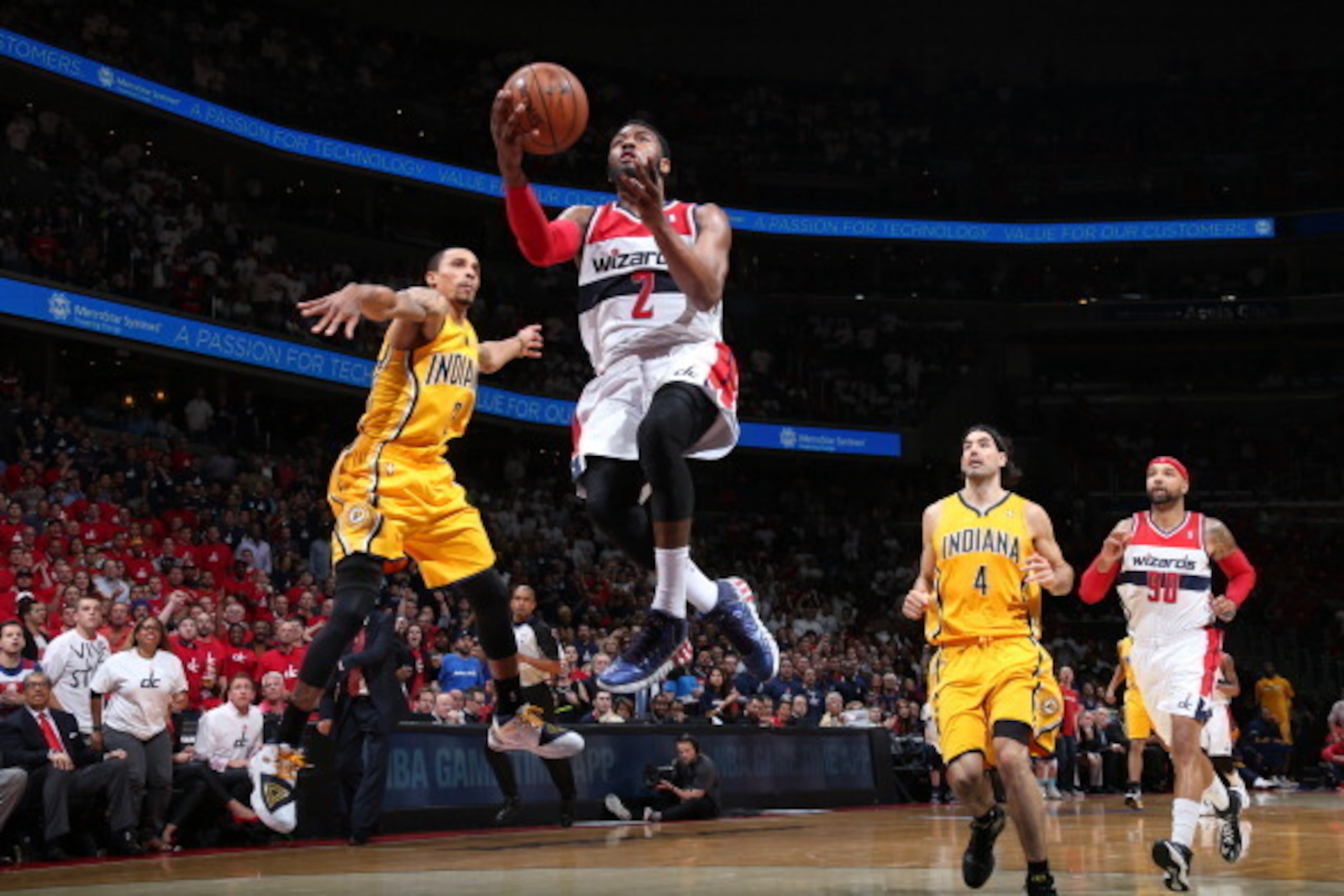 WASHINGTON, DC - MAY 15:  John Wall #2 of the Washington Wizards drives to the basket against the Indiana Pacers in Game Six of the Eastern Conference Semifinals during the 2014 NBA Playoffs at the Verizon Center on May 15, 2014 in Washington, DC. NOTE TO