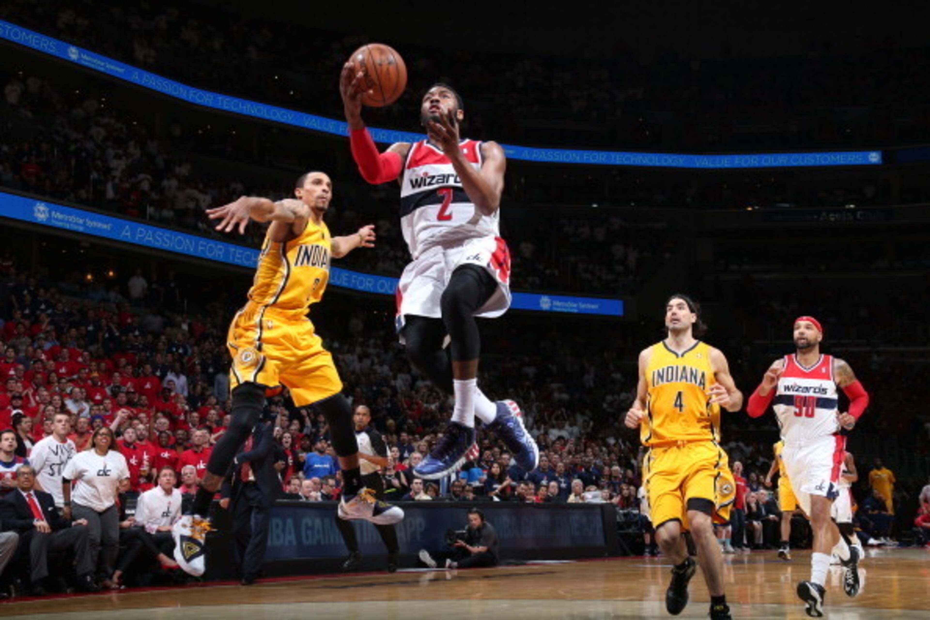 WASHINGTON, DC - MAY 15:  John Wall #2 of the Washington Wizards drives to the basket against the Indiana Pacers in Game Six of the Eastern Conference Semifinals during the 2014 NBA Playoffs at the Verizon Center on May 15, 2014 in Washington, DC. NOTE TO