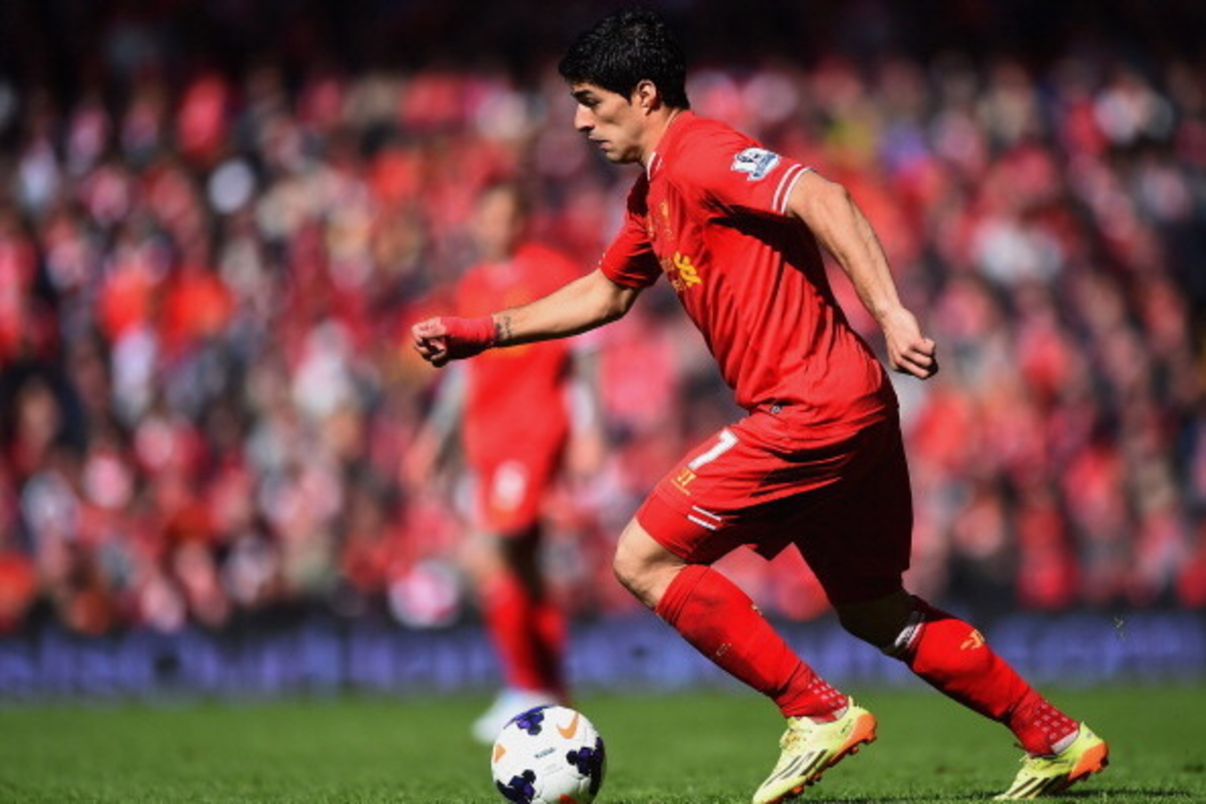 LIVERPOOL, ENGLAND - MAY 11: Luis Suarez of Liverpool in action during the Barclays Premier League match between Liverpool and Newcastle United at Anfield on May 11, 2014 in Liverpool, England. (Photo by Laurence Griffiths/Getty Images) LIVERPOOL, ENGLAND - MAY 11: Luis Suarez of Liverpool in action during the Barclays Premier League match between Liverpool and Newcastle United at Anfield on May 11, 2014 in Liverpool, England. (Photo by Laurence Griffiths/Getty Images)