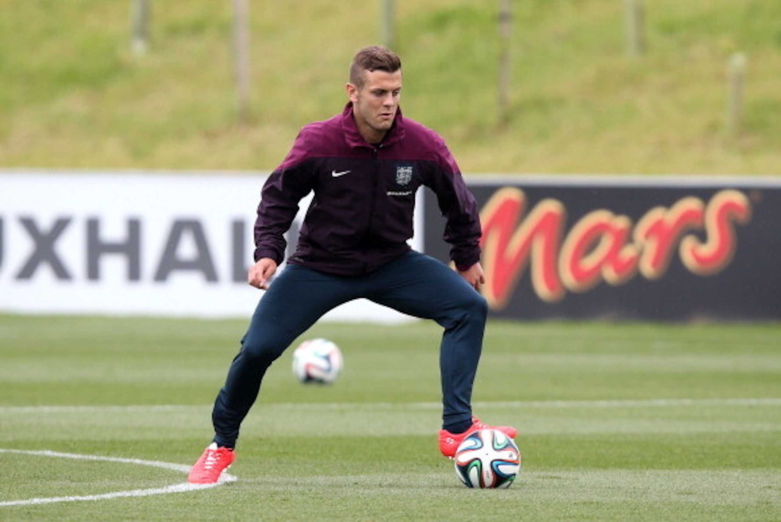 BURTON-UPON-TRENT, ENGLAND - MAY 27:  Jack Wilshere in action during a training session at St Georges Park on May 27, 2014 in Burton-upon-Trent, England. (Photo by Jan Kruger/Getty Images)