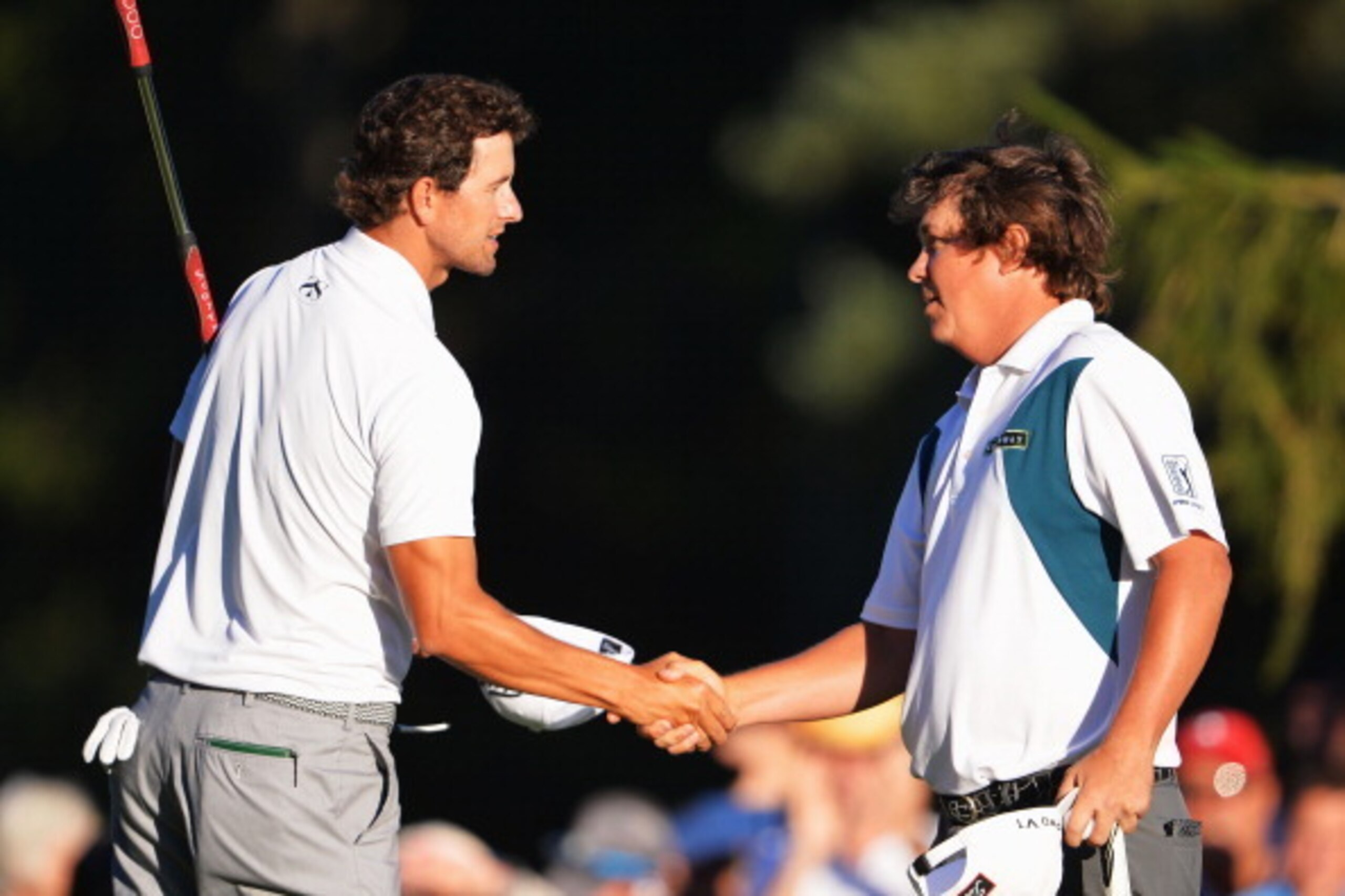 ROCHESTER, NY - AUGUST 10: Adam Scott of Australia shakes hands with Jason Dufner of USA on the 18th hole during the third round of the 95th PGA Championship at Oak Hill Country Club on August 10, 2013 in Rochester, New York.  (Photo by Stuart Franklin/Ge