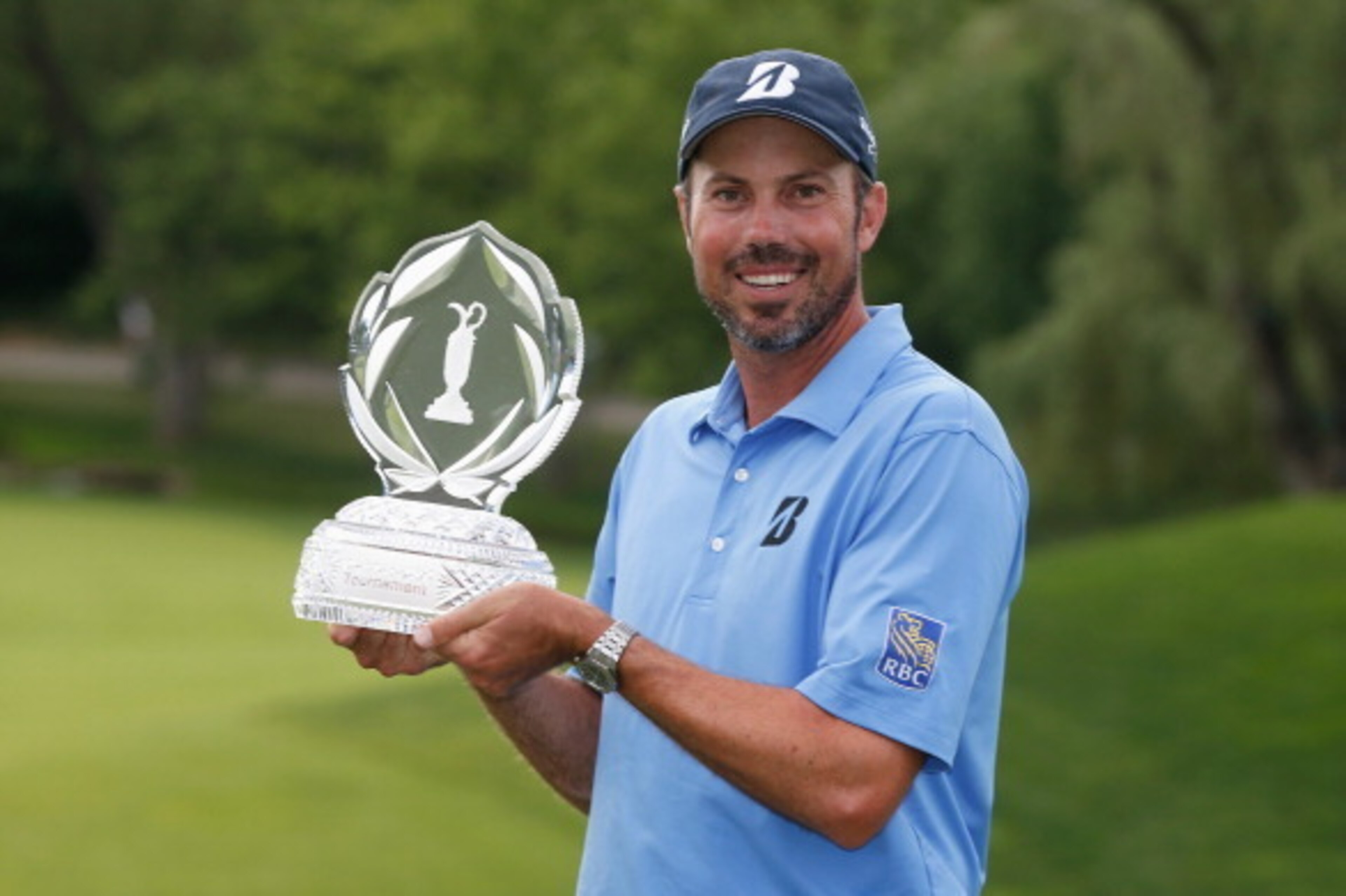 DUBLIN, OH - JUNE 02:  Matt Kuchar poses with the trophy atfer his two-stroke victory at the Memorial Tournament presented by Nationwide Insurance at Muirfield Village Golf Club on June 2, 2013 in Dublin, Ohio.  (Photo by Scott Halleran/Getty Images)