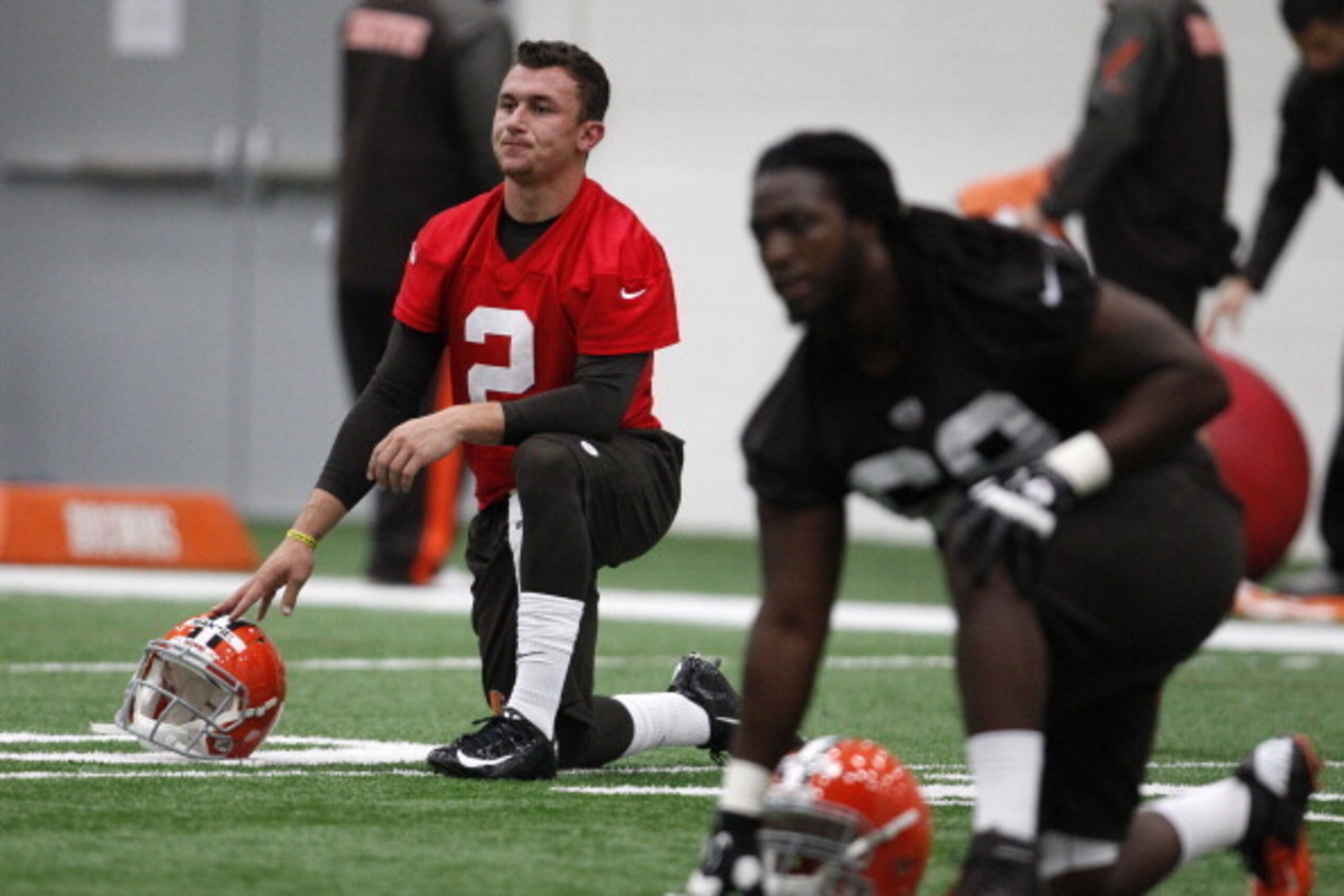 BEREA, OH - MAY 17:  Cleveland Browns draft pick Johnny Manziel #2  stretches during the Cleveland Browns rookie minicamp on May 17, 2014 at the Browns training  facility in Berea, Ohio.  (Photo by David Maxwell/Getty Images)