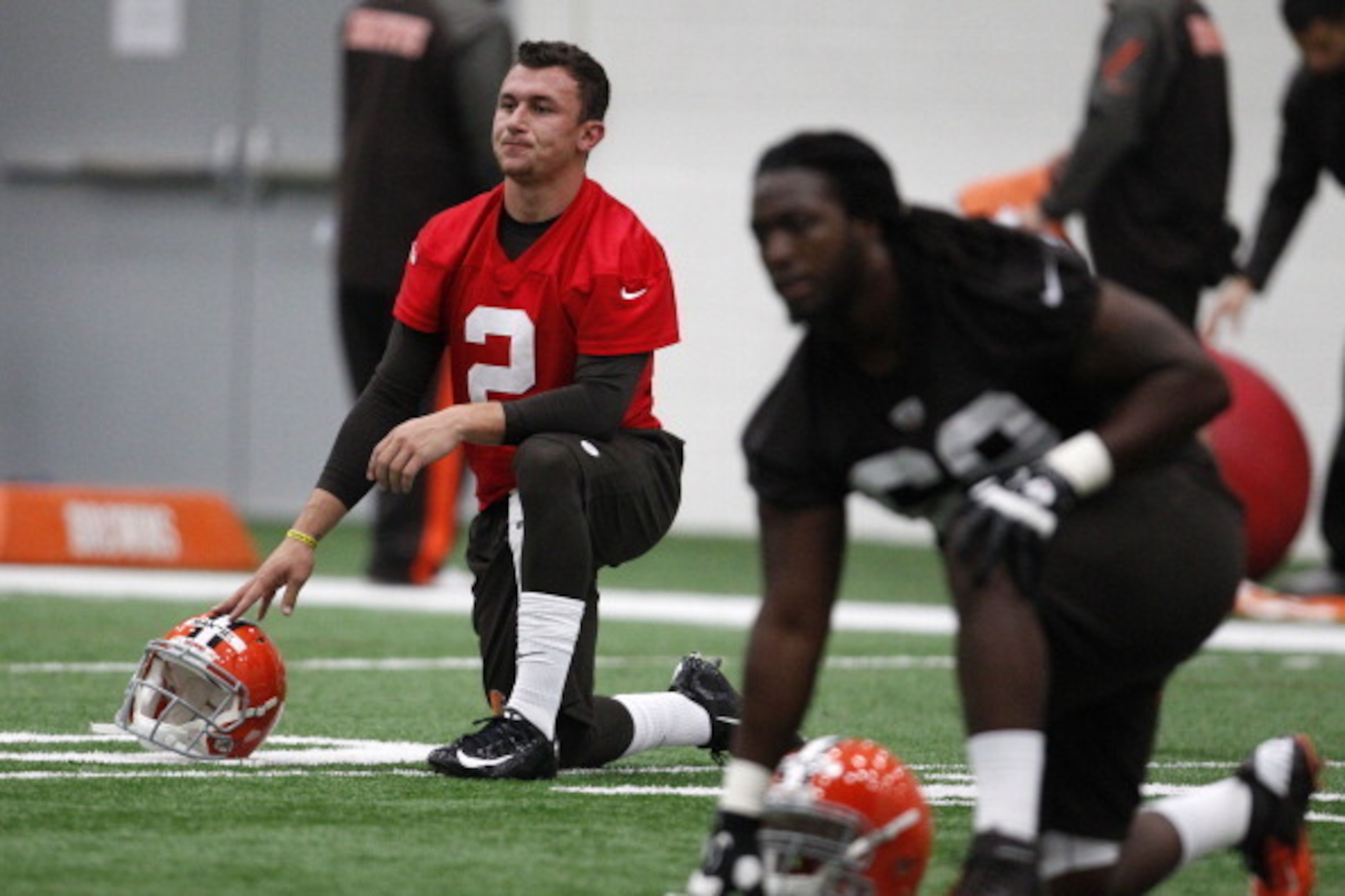 BEREA, OH - MAY 17:  Cleveland Browns draft pick Johnny Manziel #2  stretches during the Cleveland Browns rookie minicamp on May 17, 2014 at the Browns training  facility in Berea, Ohio.  (Photo by David Maxwell/Getty Images)