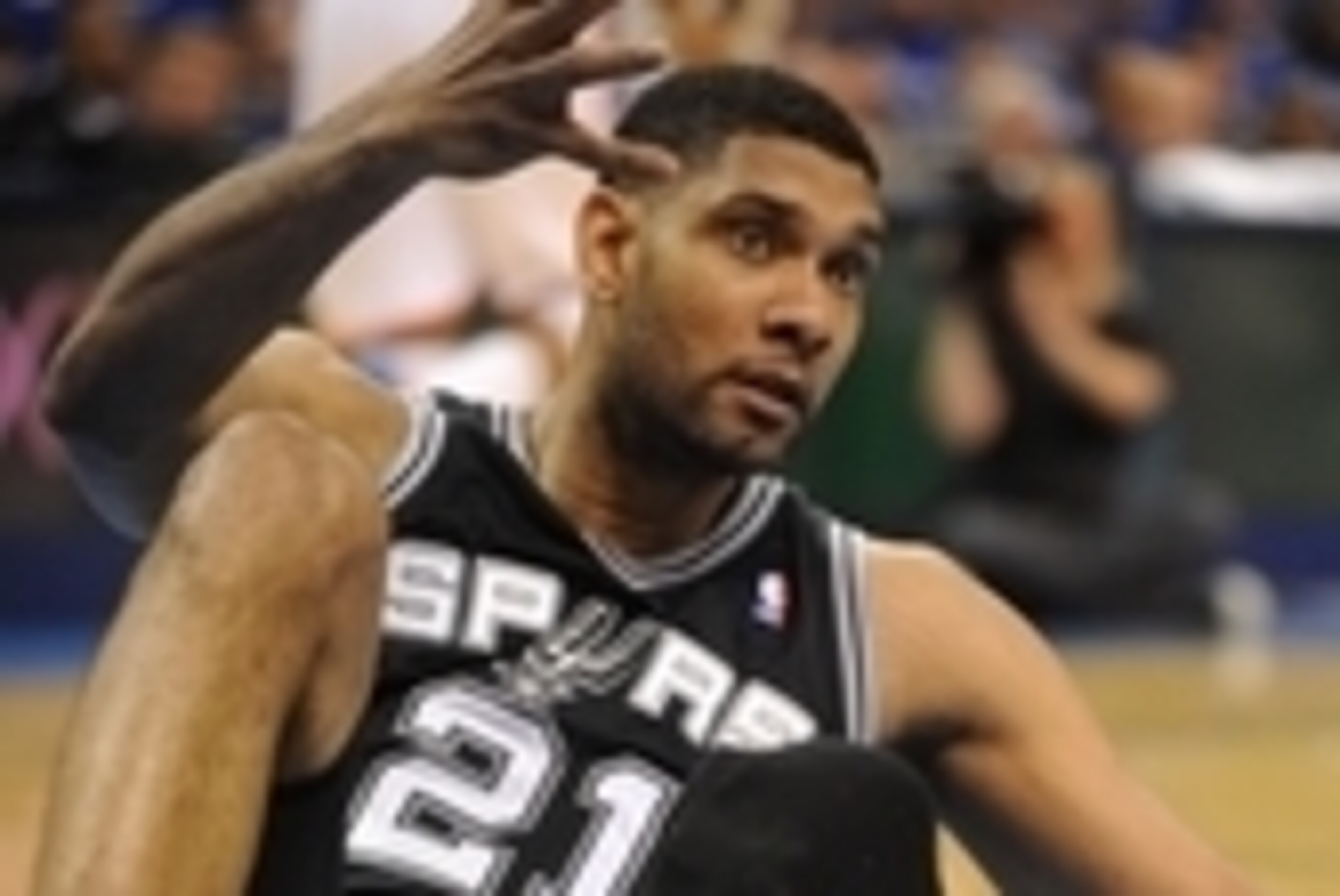 May 25, 2014; Oklahoma City, OK, USA; San Antonio Spurs forward Tim Duncan (21) reacts to a play against the Oklahoma City Thunder during the third quarter in game three of the Western Conference Finals of the 2014 NBA Playoffs at Chesapeake Energy Arena.