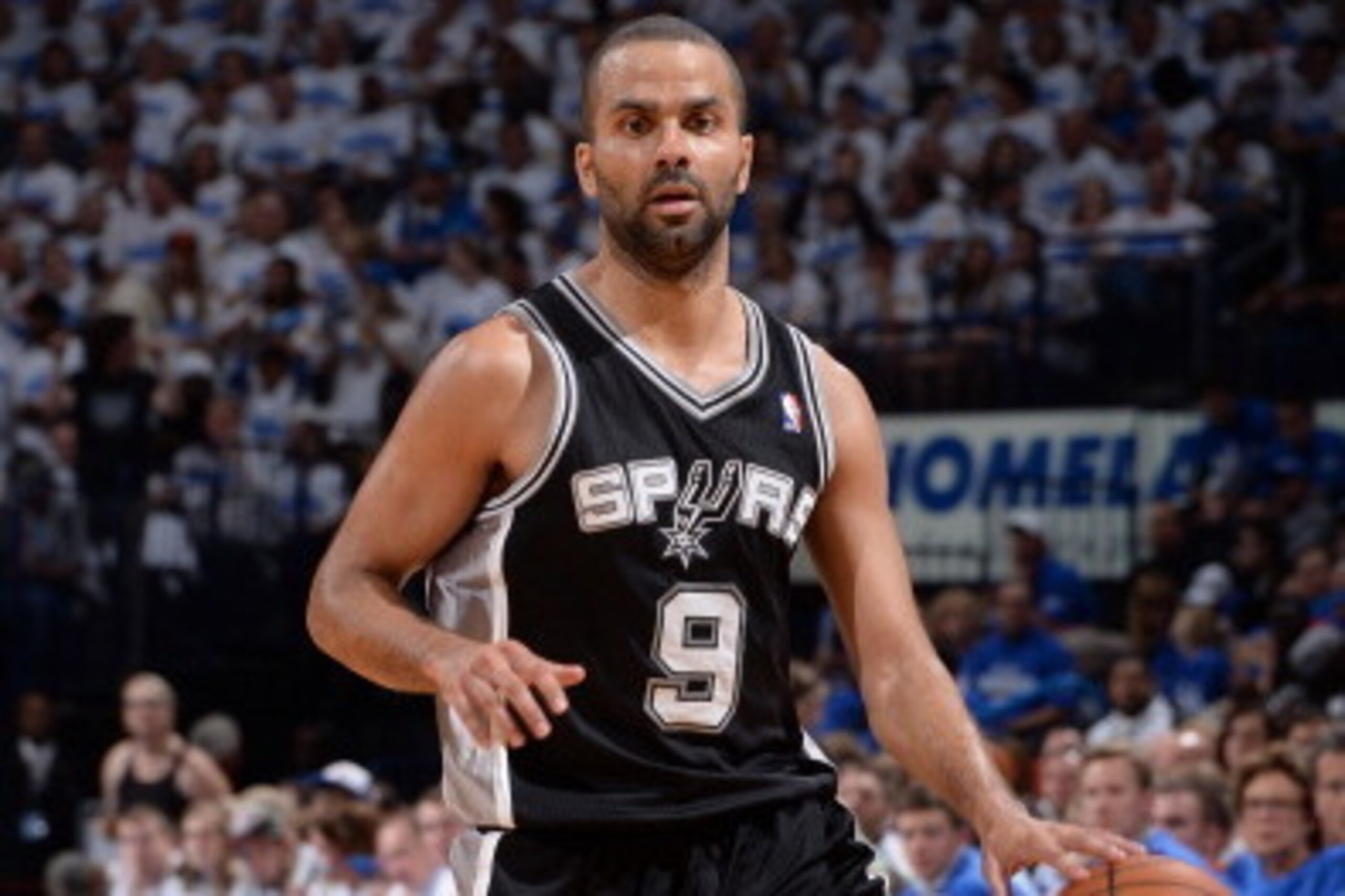 OKLAHOMA CITY, OK - MAY 27: Tony Parker #9 of the San Antonio Spurs handles the ball against the Oklahoma City Thunder in Game Four of the Western Conference Finals during the 2014 NBA Playoffs on May 27, 2014 at the Chesapeake Energy Arena in Oklahoma Ci OKLAHOMA CITY, OK - MAY 27: Tony Parker #9 of the San Antonio Spurs handles the ball against the Oklahoma City Thunder in Game Four of the Western Conference Finals during the 2014 NBA Playoffs on May 27, 2014 at the Chesapeake Energy Arena in Oklahoma Ci