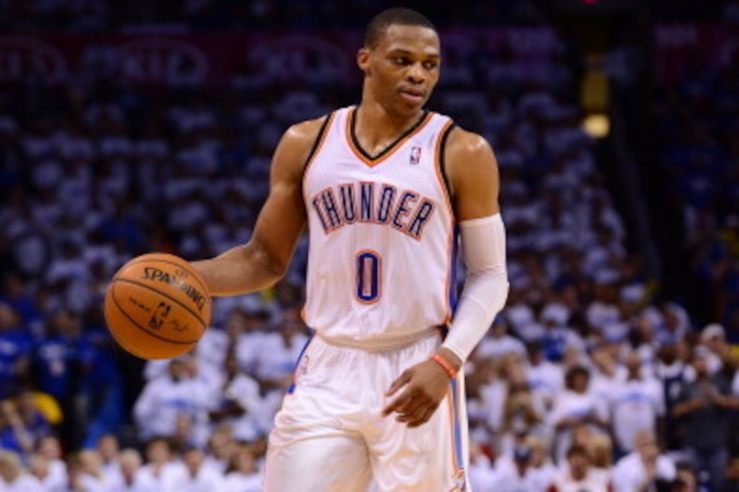 OKLAHOMA CITY, OK - MAY 27: Russell Westbrook #0 of the Oklahoma City Thunder dribbles the ball against the San Antonio Spurs in Game Four of the Western Conference Finals during the 2014 NBA Playoffs on May 27, 2014 at the Chesapeake Energy Arena in Okla OKLAHOMA CITY, OK - MAY 27: Russell Westbrook #0 of the Oklahoma City Thunder dribbles the ball against the San Antonio Spurs in Game Four of the Western Conference Finals during the 2014 NBA Playoffs on May 27, 2014 at the Chesapeake Energy Arena in Okla