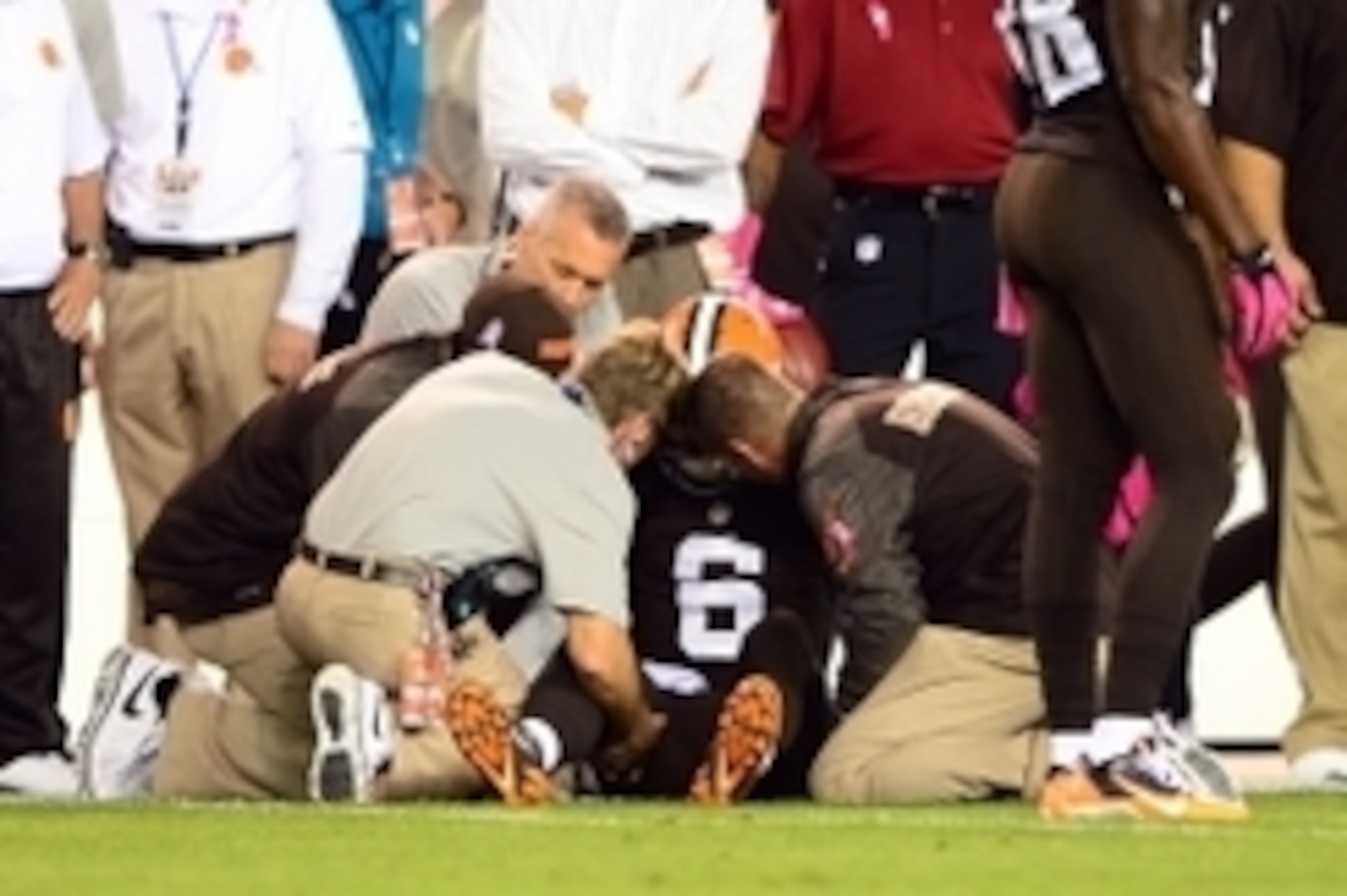 Oct 3, 2013; Cleveland, OH, USA; Cleveland Browns quarterback Brian Hoyer (6) is attended to by medical staff after being injured during the first quarter against the Buffalo Bills at FirstEnergy Stadium. Mandatory Credit: Andrew Weber-USA TODAY Sports