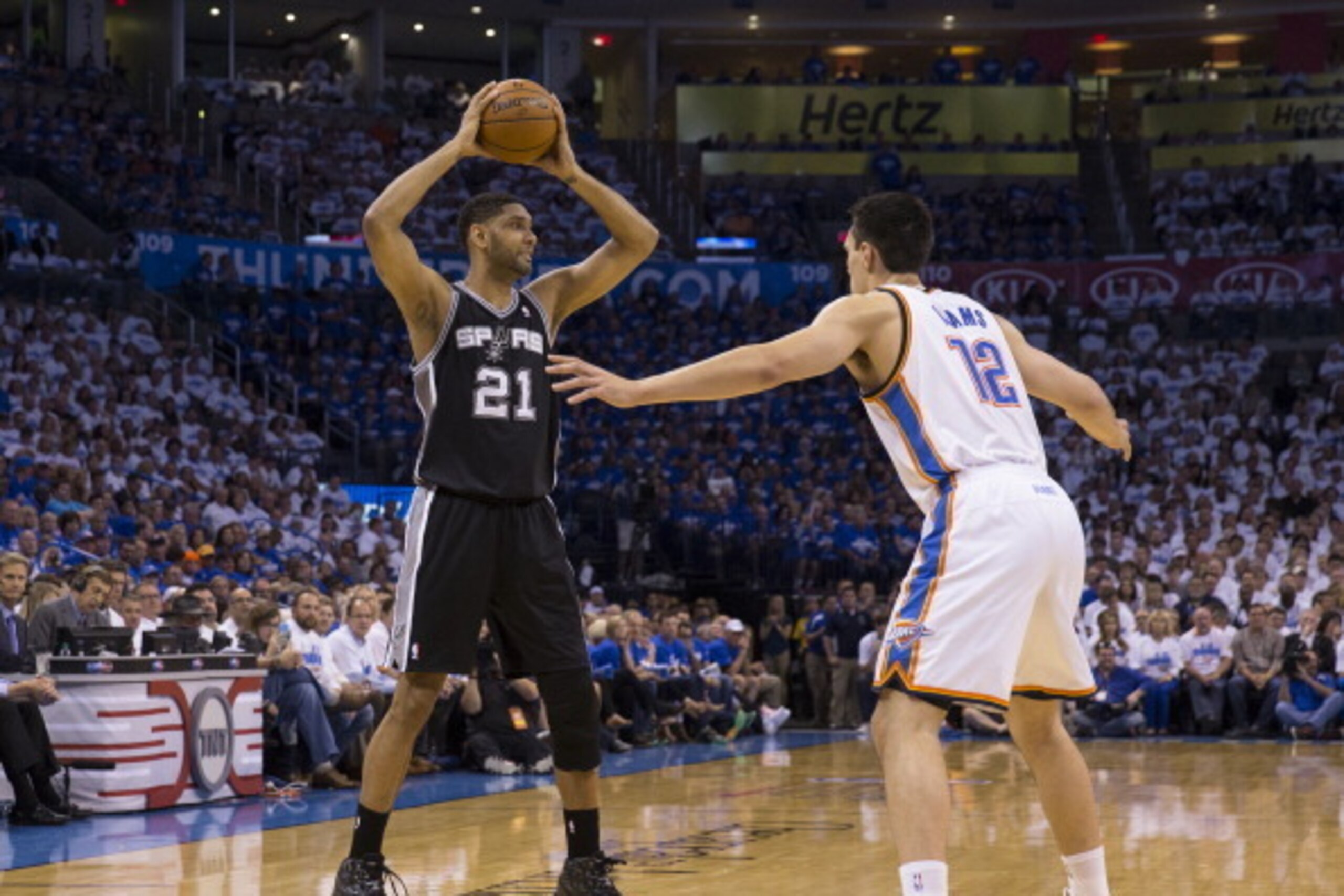 OKLAHOMA CITY, OK - May 27: Tim Duncan #21 of the San Antonio Spurs looks to pass the ball against the Oklahoma City Thunder in Game 4 of the Western Conference Finals during the 2014 NBA Playoffs at the Chesapeake Arena on May 27, 2014 in Oklahoma City, 