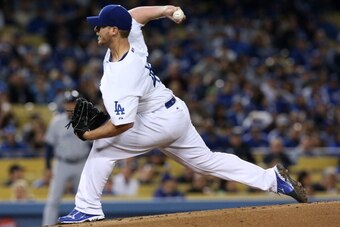 LOS ANGELES, CA - APRIL 15:  Chad Billingsley of the Los Angeles Dodgers throws a pitch against the San Diego Padres at Dodger Stadium on April 15, 2013 in Los Angeles, California.  All uniformed team members are wearing jersey number 42 in honor of Jacki
