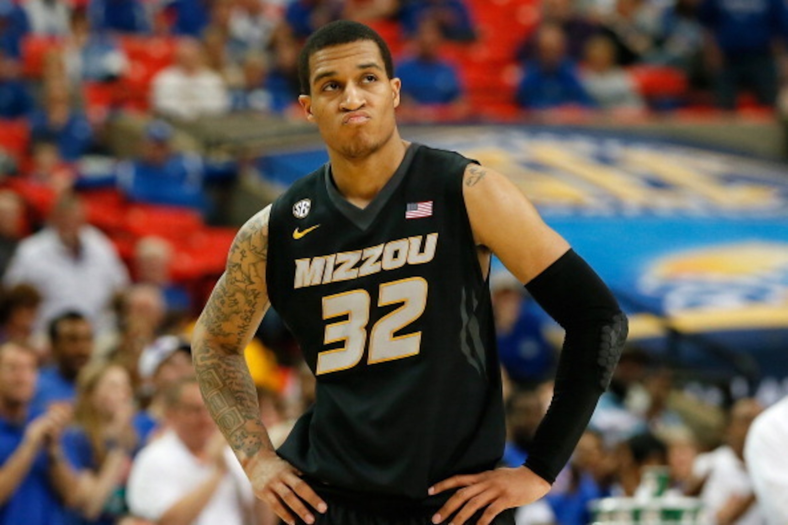 ATLANTA, GA - MARCH 14:  Jabari Brown #32 of the Missouri Tigers reacts in the final minutes of their 72-49 loss to the Florida Gators during the quarterfinals of the SEC Men's Basketball Tournament at Georgia Dome on March 14, 2014 in Atlanta, Georgia.  