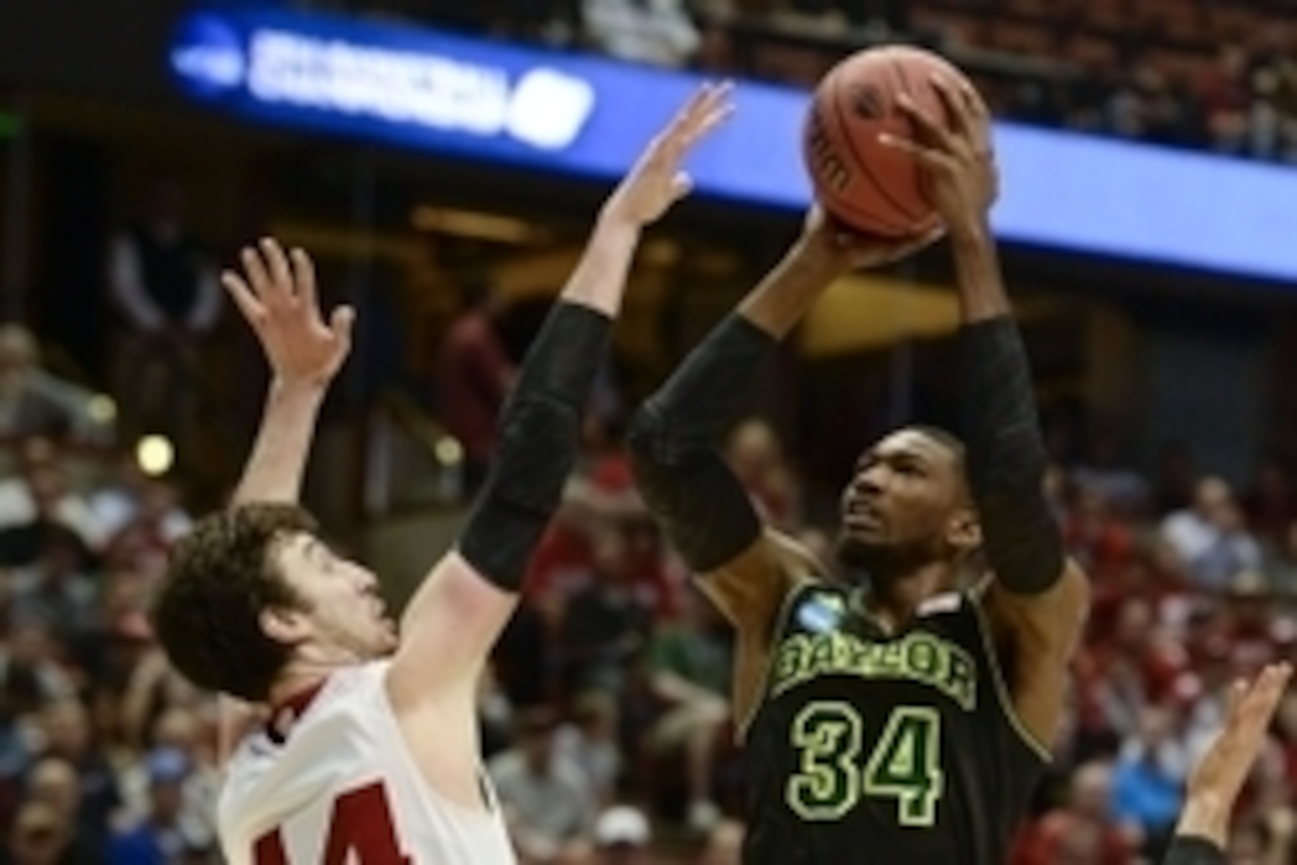 Mar 27, 2014; Anaheim, CA, USA; Baylor Bears forward Cory Jefferson (34) shoots the ball against Wisconsin Badgers forward Frank Kaminsky (44) during the second half in the semifinals of the west regional of the 2014 NCAA Mens Basketball Championship tour