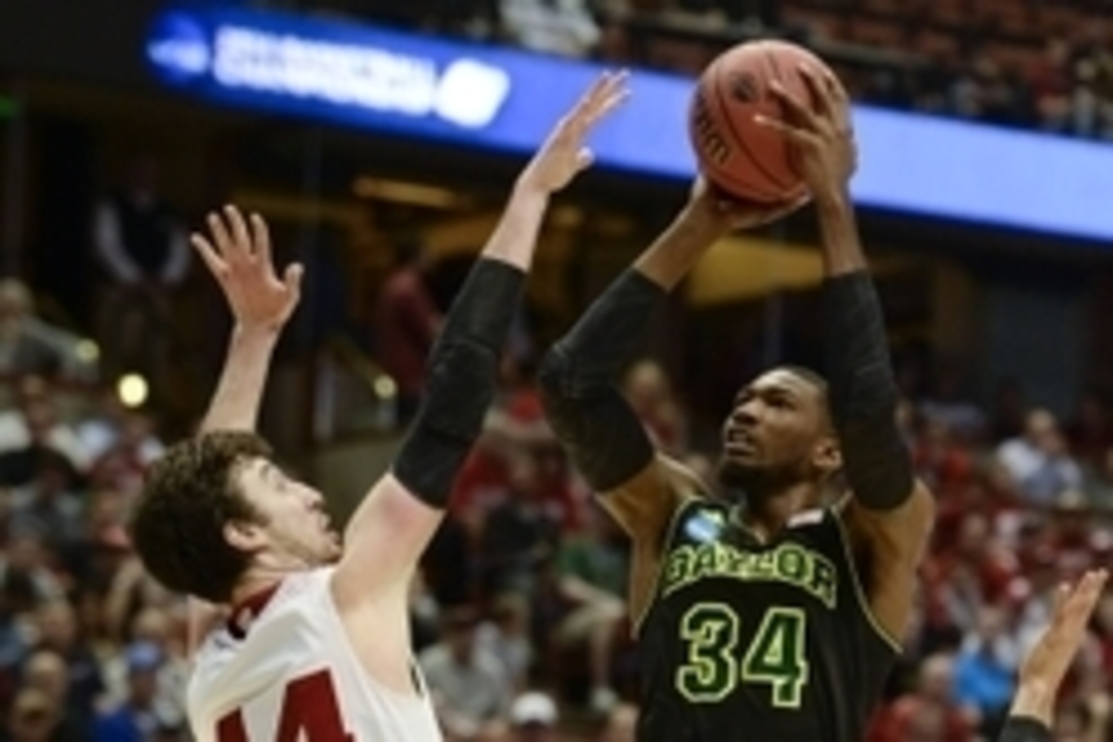 Mar 27, 2014; Anaheim, CA, USA; Baylor Bears forward Cory Jefferson (34) shoots the ball against Wisconsin Badgers forward Frank Kaminsky (44) during the second half in the semifinals of the west regional of the 2014 NCAA Mens Basketball Championship tour Mar 27, 2014; Anaheim, CA, USA; Baylor Bears forward Cory Jefferson (34) shoots the ball against Wisconsin Badgers forward Frank Kaminsky (44) during the second half in the semifinals of the west regional of the 2014 NCAA Mens Basketball Championship tour