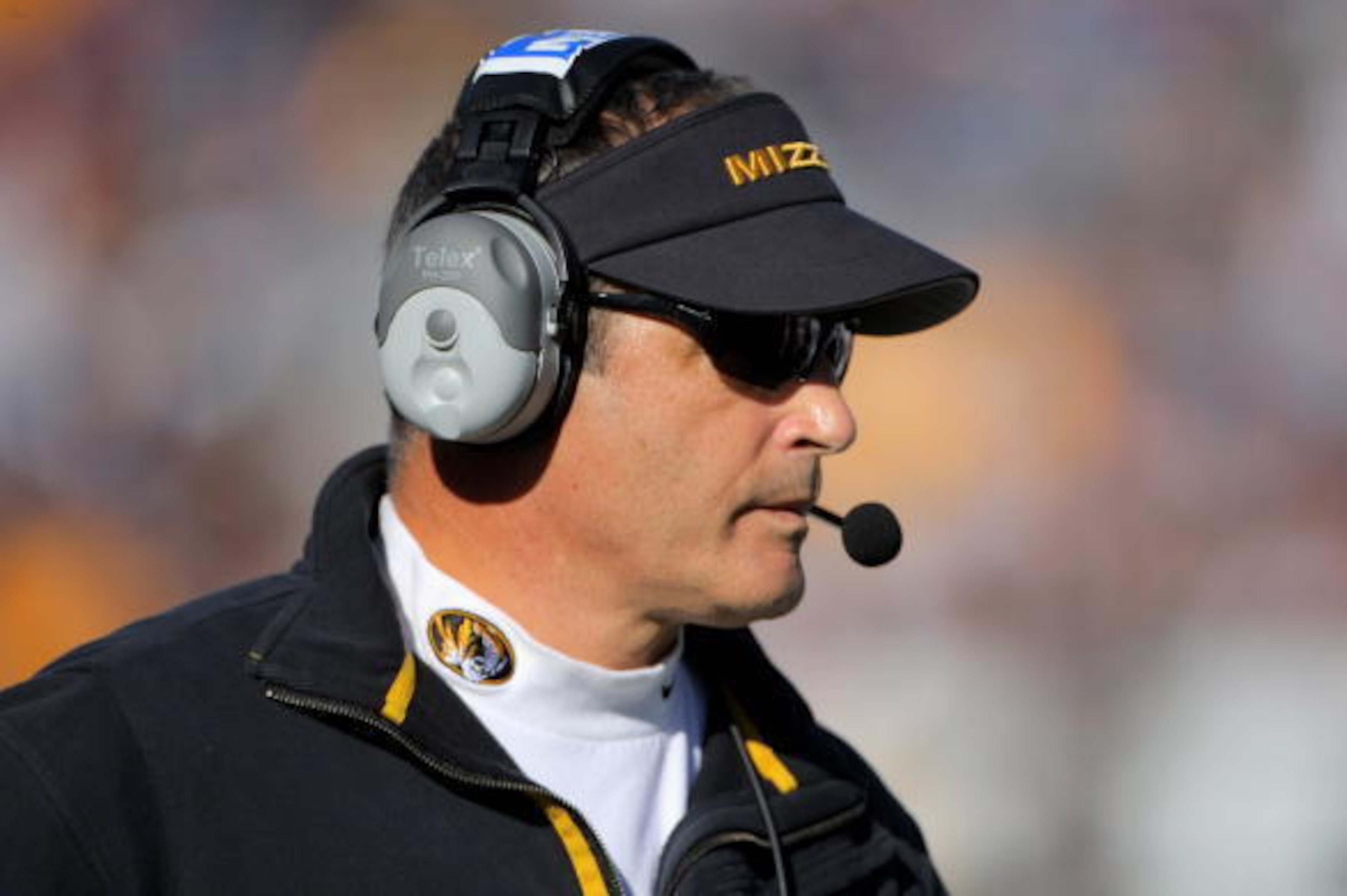 BOULDER, CO - OCTOBER 31:  Head coach Gary Pinkel of the Missouri Tigers leads his team against the Colorado Buffaloes at Folsom Field on October 31, 2009 in Boulder, Colorado. Missouri defeated Colorado 36-17.  (Photo by Doug Pensinger/Getty Images)