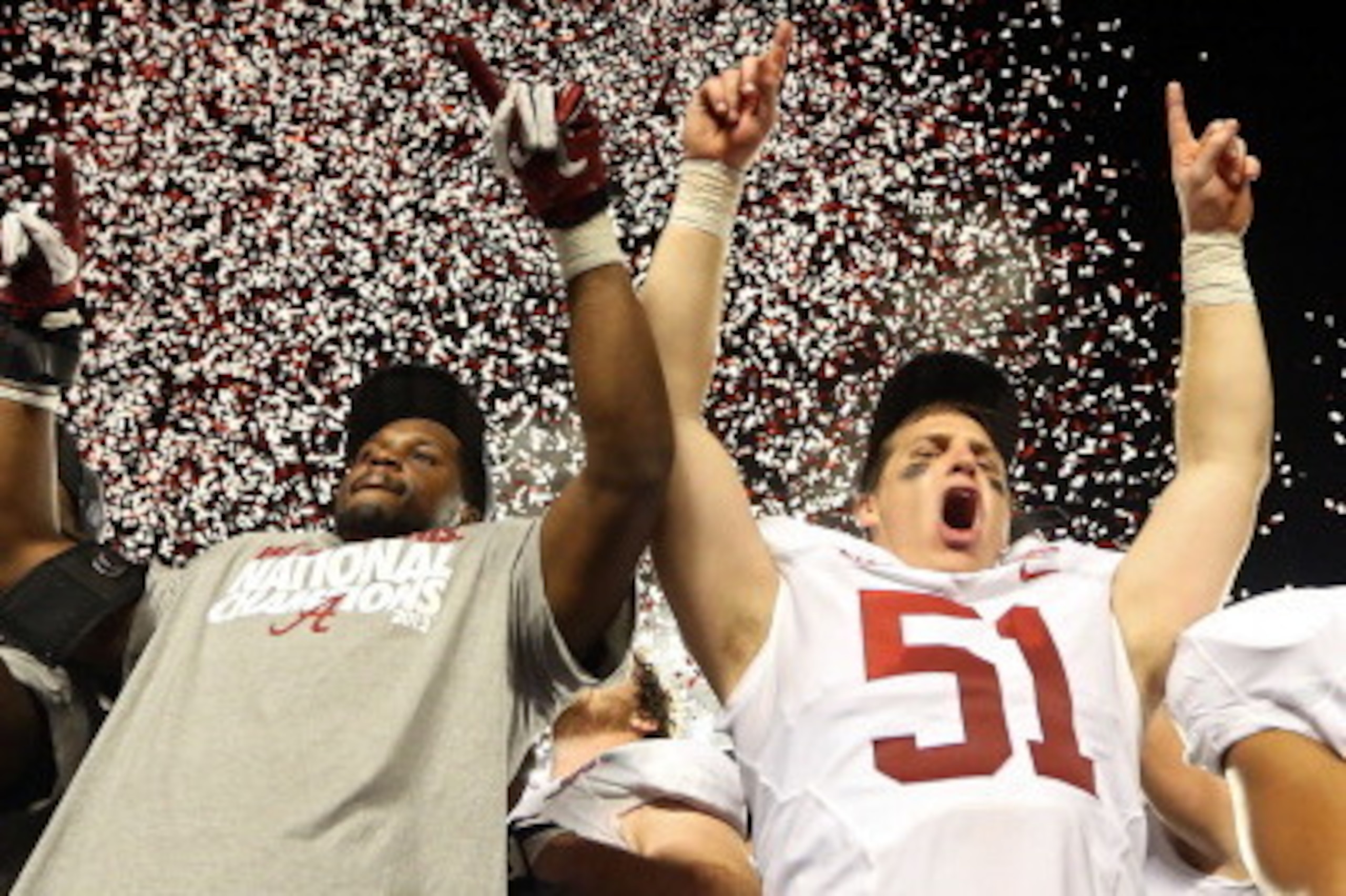MIAMI GARDENS, FL - JANUARY 07:  The Alabama Crimson Tide celebrate after defeating the Notre Dame Fighting Irish by a score of 42-14 to win the 2013 Discover BCS National Championship game at Sun Life Stadium on January 7, 2013 in Miami Gardens, Florida.