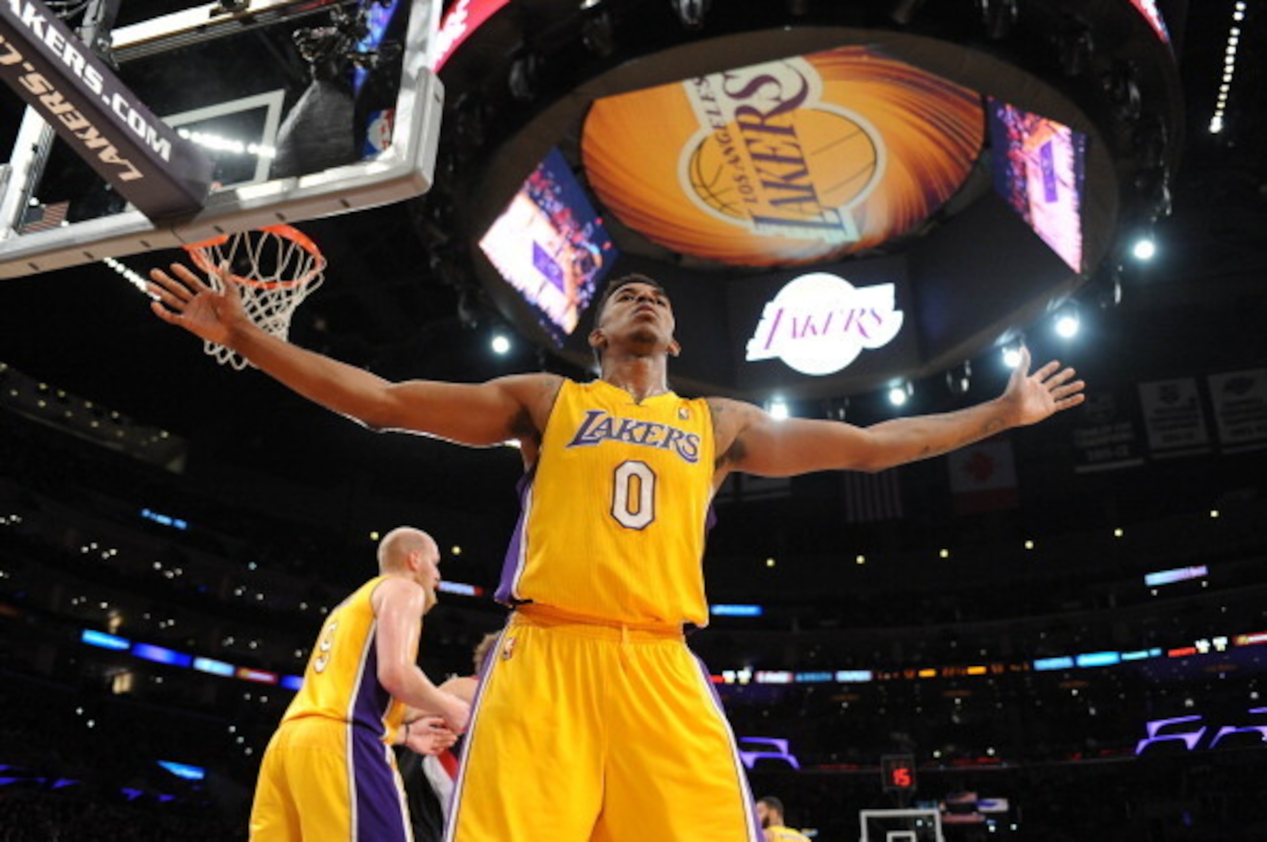 LOS ANGELES, CA - APRIL 1: Nick Young #0 of the Los Angeles Lakers defends an inbounds pass against the Portland Trail Blazers at Staples Center on April 1, 2014 in Los Angeles, California. NOTE TO USER: User expressly acknowledges and agrees that, by dow LOS ANGELES, CA - APRIL 1: Nick Young #0 of the Los Angeles Lakers defends an inbounds pass against the Portland Trail Blazers at Staples Center on April 1, 2014 in Los Angeles, California. NOTE TO USER: User expressly acknowledges and agrees that, by dow