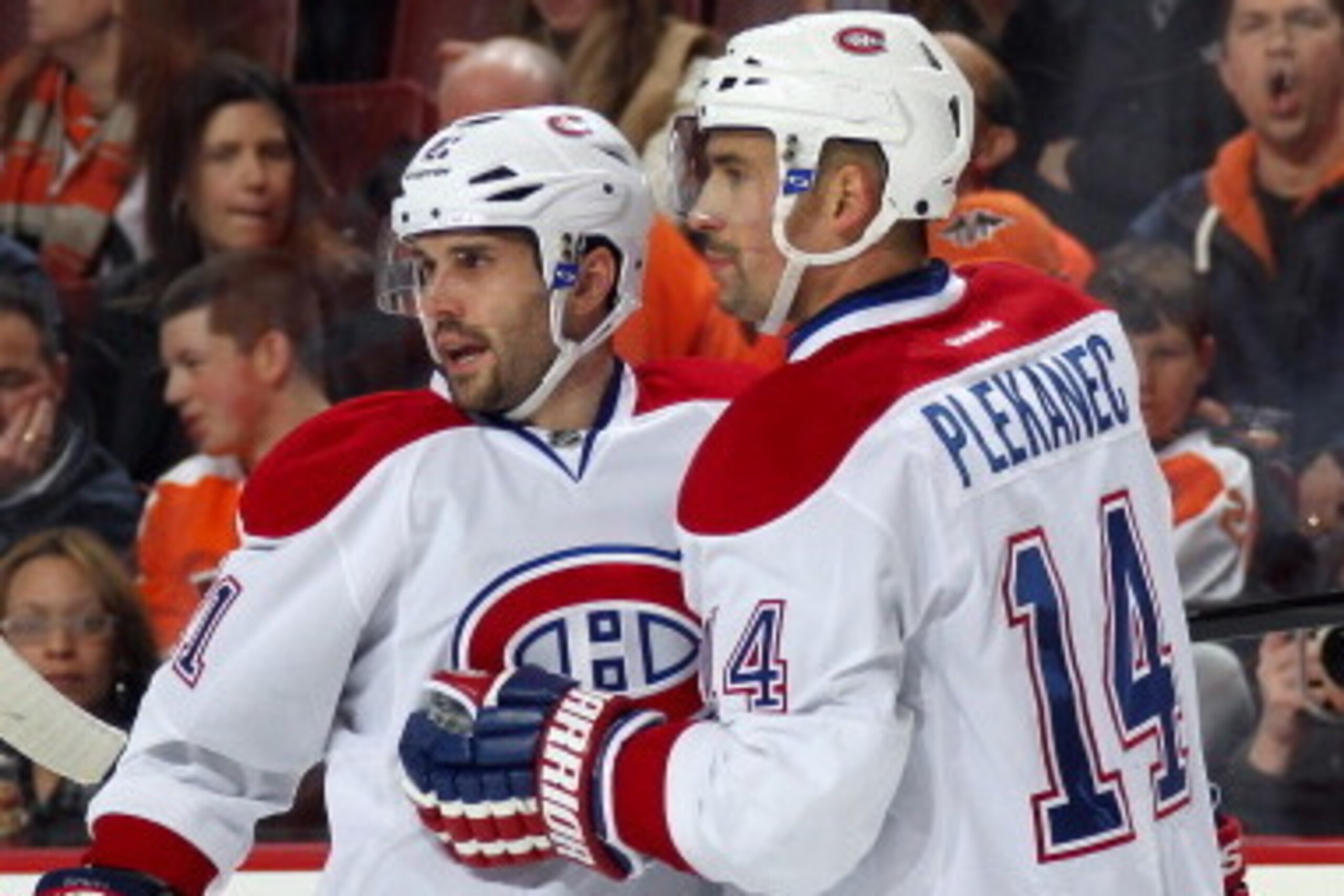 PHILADELPHIA, PA - JANUARY 08: Brian Gionta #21 and Tomas Plekanec #14 of the Montreal Canadiens celebrate Plekanec's second period short-handed goal against the Philadelphia Flyers on January 8, 2014 at the Wells Fargo Center in Philadelphia, Pennsylvani