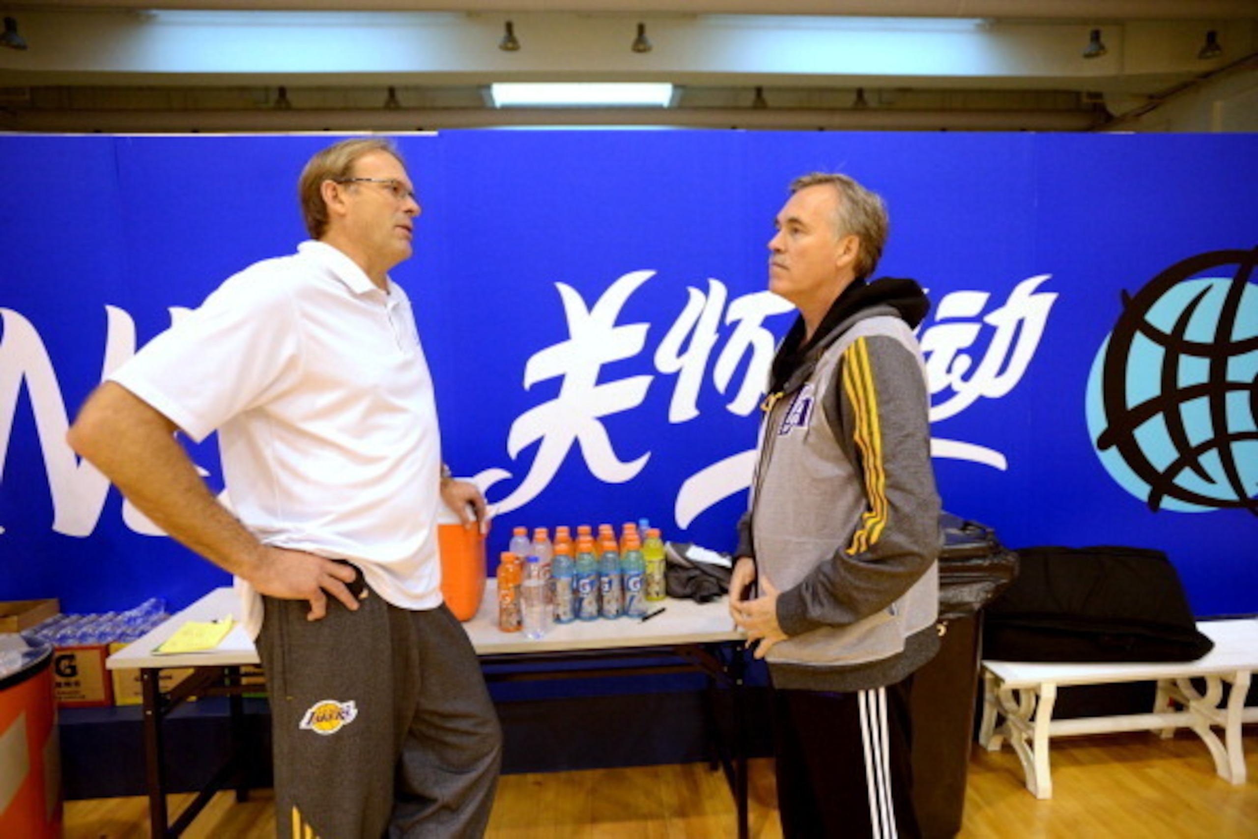 SHANGHAI, CHINA - OCTOBER 17: Coaches Kurt Rambis and Mike D'Antoni speaks during practice as part of the 103 Global Games on October 17, 2013 at the Oriental Sports Center Shanghai, China. NOTE TO USER: User expressly acknowledges and agrees that, by dow