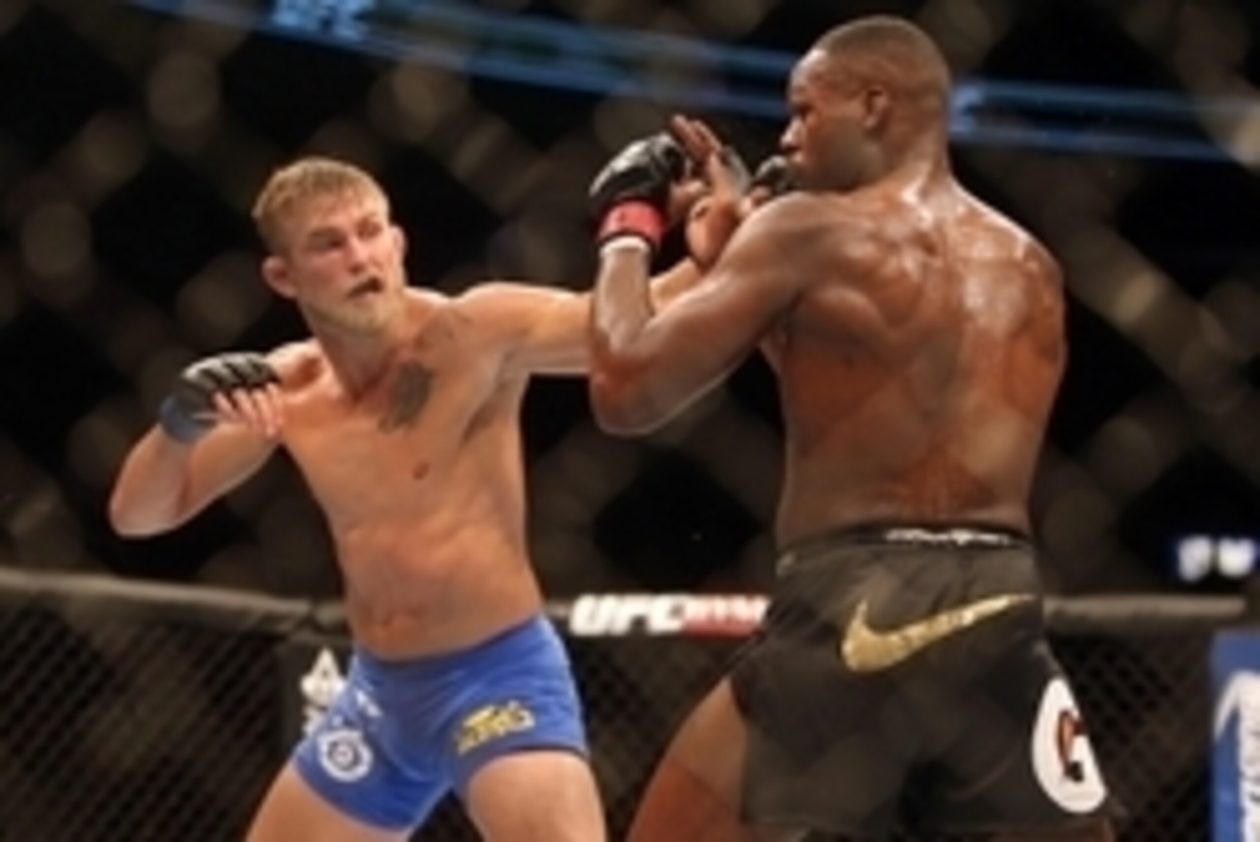 Sep 21, 2013; Toronto, Ontario, CAN; Alexander Gustafsson (left) fights Jon Jones during their Light Heavyweight Championship bout at UFC 165 at the Air Canada Centre. Mandatory Credit: Tom Szczerbowski-USA TODAY Sports