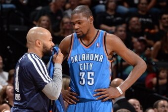 SAN ANTONIO, TX - MAY 21:  Derek Fisher #6 and Kevin Durant #35 of the Oklahoma City Thunder talk in the game against the San Antonio Spurs in Game Two of the Western Conference Finals during the 2014 NBA Playoffs on May 21, 2014 at the AT&T Center in San