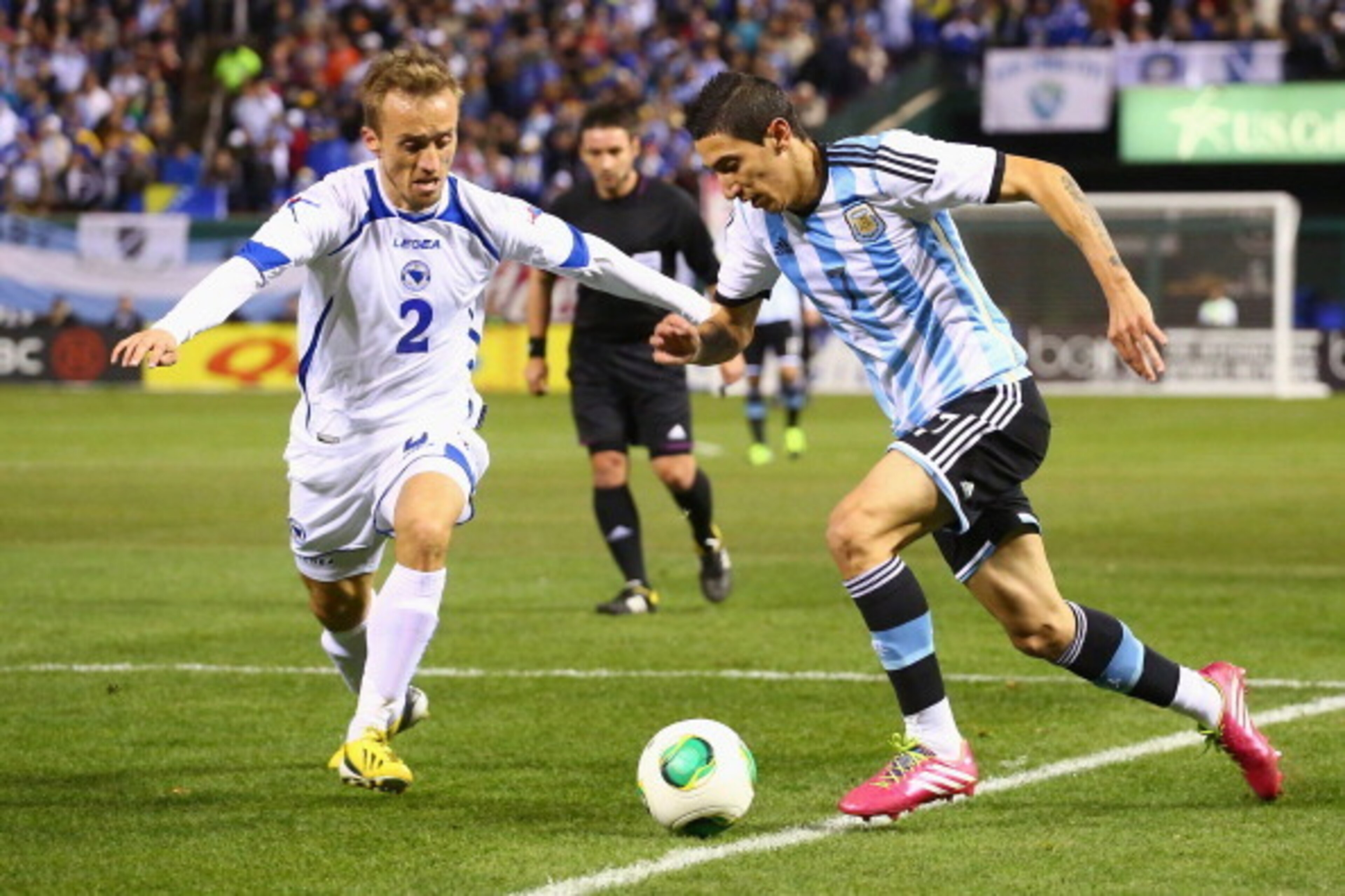 ST. LOUIS, MO - NOVEMBER 18: Angel Di Maria #7 drives to the goal against Avdija Vrsajevic #2 of Bosnia-Herzegovina during the international friendly match between Bosnia-Herzegovina and Argentina at Busch Stadium on November 18, 2013 in St. Louis, Missou