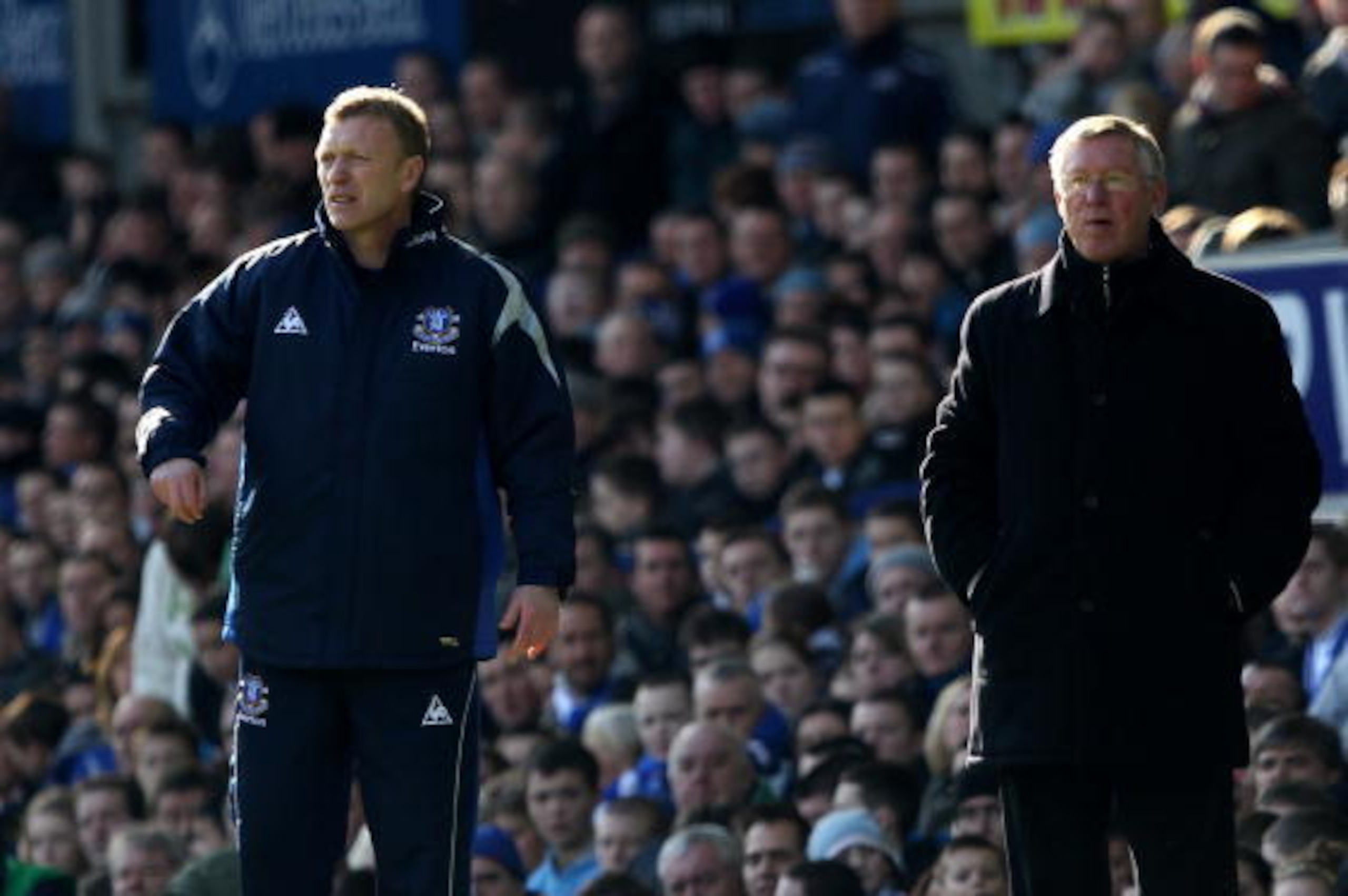 LIVERPOOL, ENGLAND - FEBRUARY 20:  Everton manager David Moyes with Manchester United manager Sir Alex Ferguson during the Barclays Premier League match between Everton and Manchester United at Goodison Park on February 20, 2010 in Liverpool, England.  (P