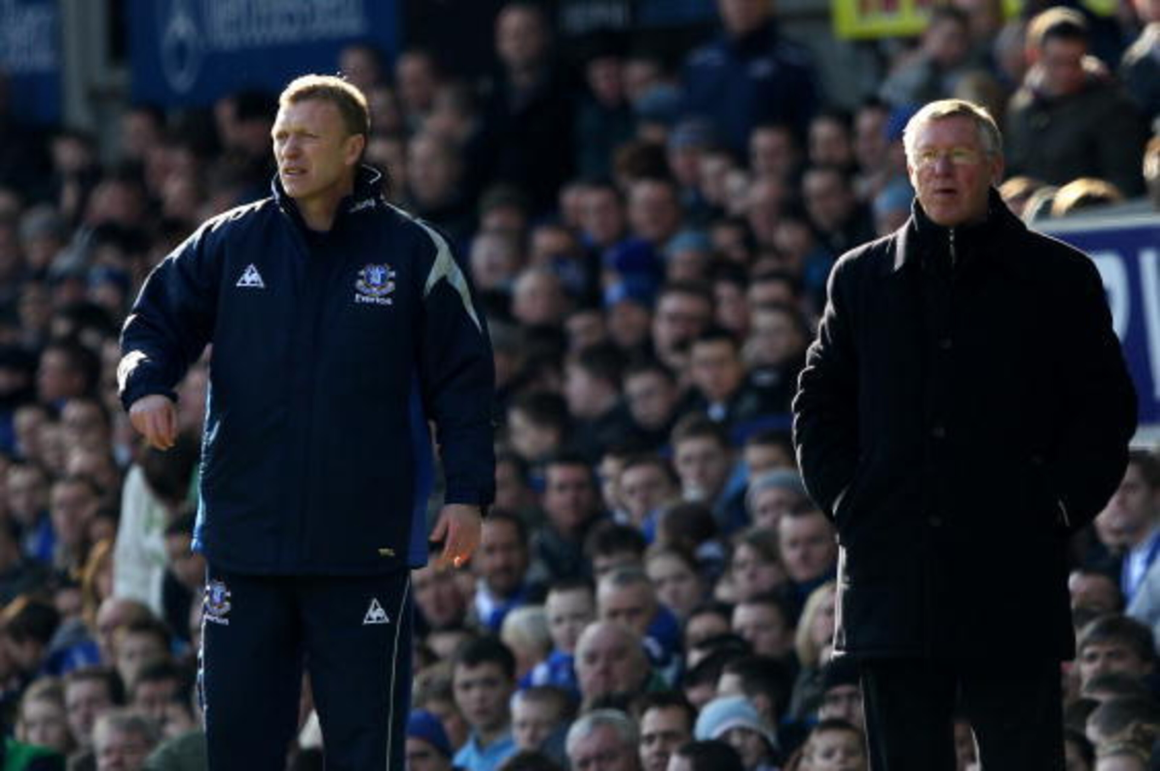 LIVERPOOL, ENGLAND - FEBRUARY 20:  Everton manager David Moyes with Manchester United manager Sir Alex Ferguson during the Barclays Premier League match between Everton and Manchester United at Goodison Park on February 20, 2010 in Liverpool, England.  (P