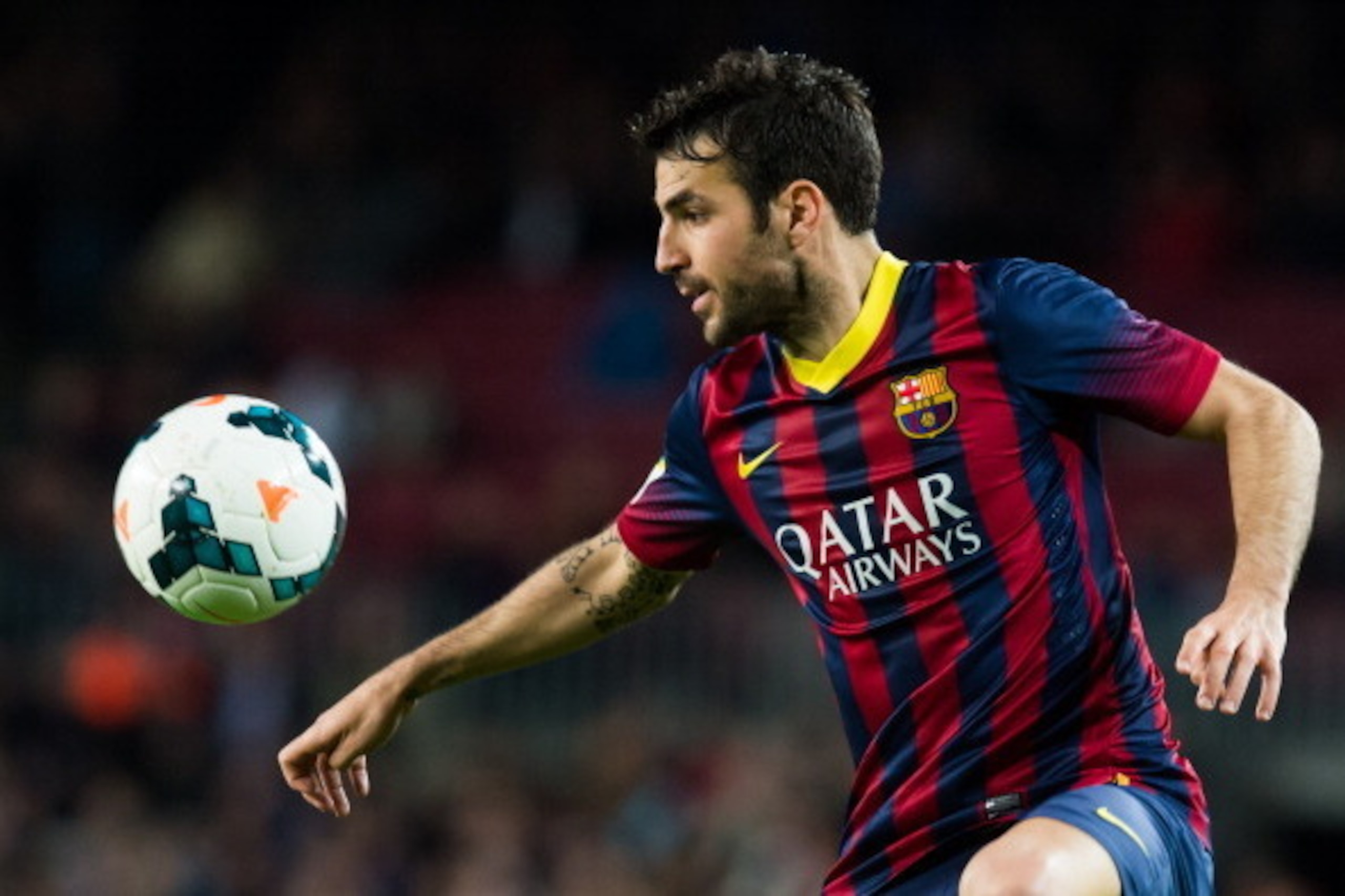 BARCELONA, SPAIN - MARCH 26: Cesc Fabregas of FC Barcelona controls the ball during the La Liga match between FC Barcelona and RC Celta de Vigo at Camp Nou on March 26, 2014 in Barcelona, Spain. (Photo by Alex Caparros/Getty Images)
