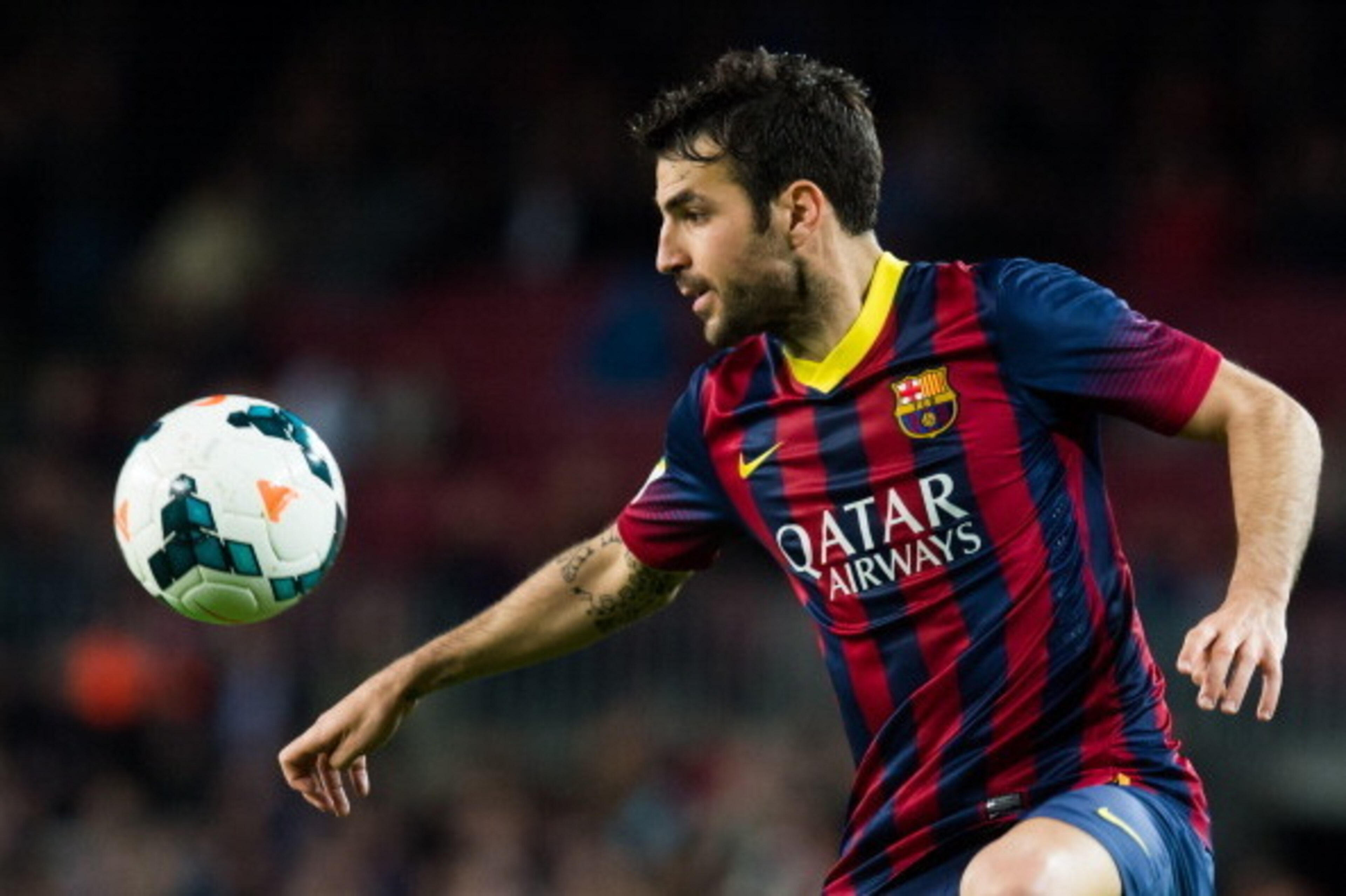 BARCELONA, SPAIN - MARCH 26: Cesc Fabregas of FC Barcelona controls the ball during the La Liga match between FC Barcelona and RC Celta de Vigo at Camp Nou on March 26, 2014 in Barcelona, Spain. (Photo by Alex Caparros/Getty Images)