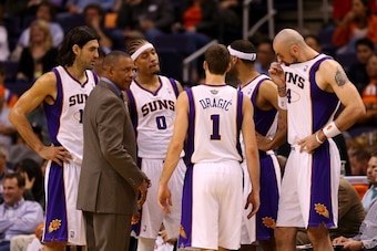 PHOENIX, AZ - NOVEMBER 14:  (L-R) Luis Scola #14, head coach Alvin Gentry, Michael Beasley #0, Goran Dragic #1, Jared Dudley #3 and Marcin Gortat #4 of the Phoenix Suns during a break from the NBA game against the Chicago Bulls at US Airways Center on Nov