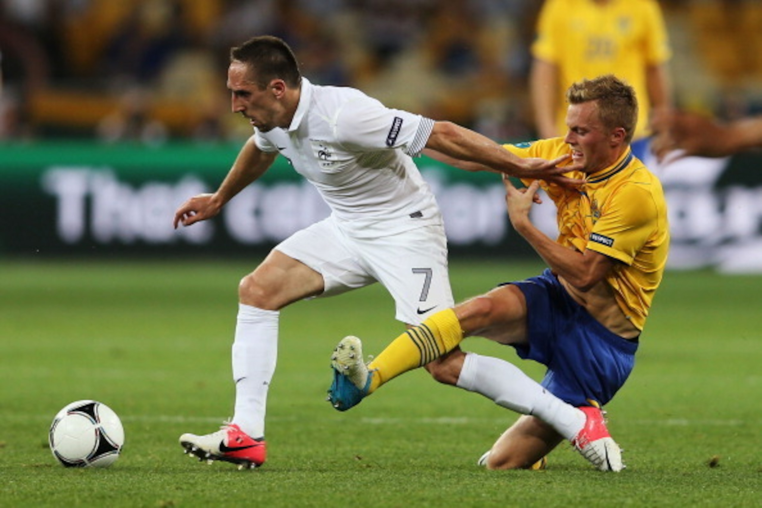 KIEV, UKRAINE - JUNE 19: Franck Ribery of France is tackled by Sebastian Larsson of Sweden during the UEFA EURO 2012 group D match between Sweden and France at The Olympic Stadium on June 19, 2012 in Kiev, Ukraine. (Photo by Julian Finney/Getty Images) KIEV, UKRAINE - JUNE 19: Franck Ribery of France is tackled by Sebastian Larsson of Sweden during the UEFA EURO 2012 group D match between Sweden and France at The Olympic Stadium on June 19, 2012 in Kiev, Ukraine. (Photo by Julian Finney/Getty Images)