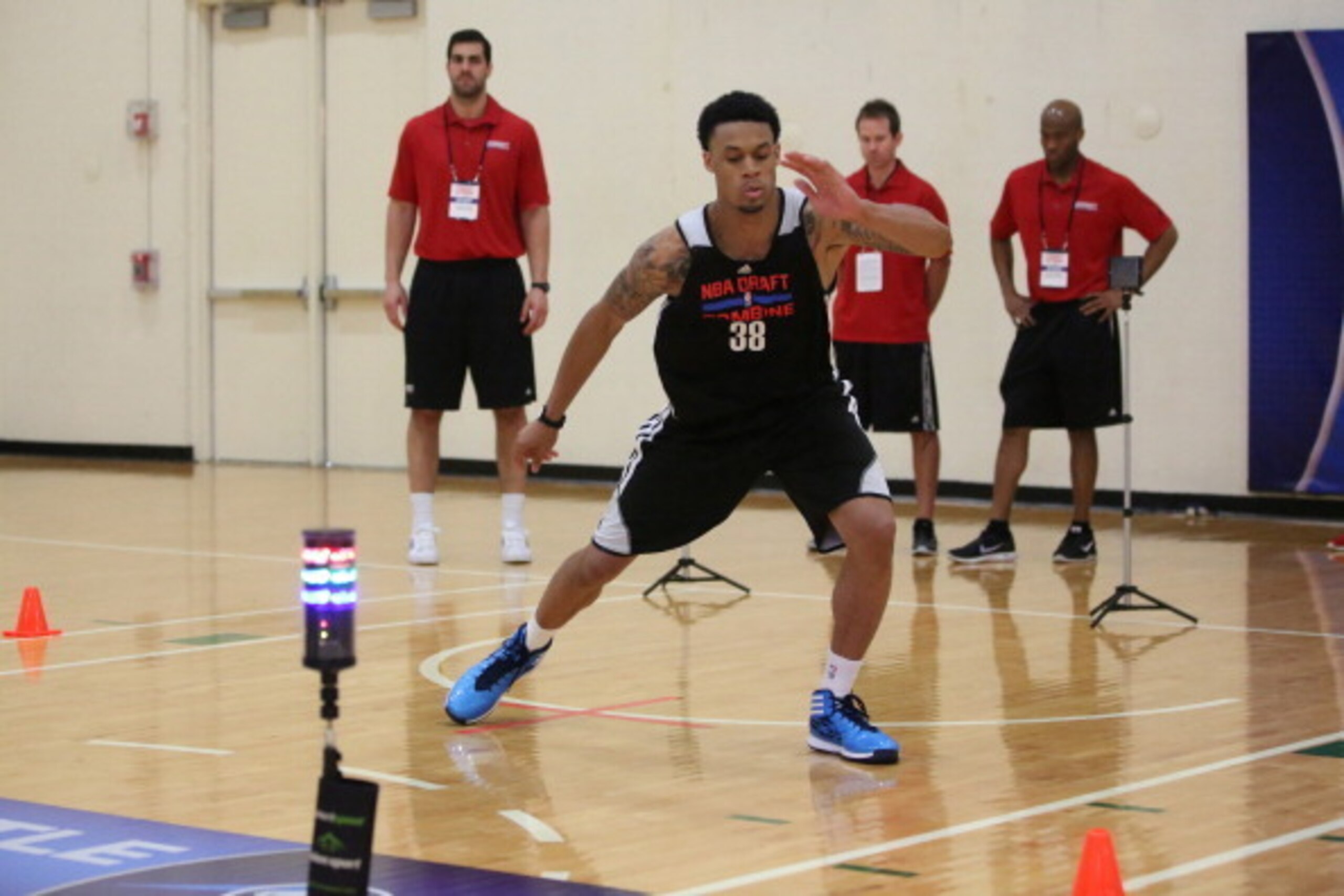 CHICAGO, IL - May 16:   K.J. McDaniels participates in drills during the 2014 Draft Combine on May 16, 2014 at Quest Multisport in Chicago, Illinois. NOTE TO USER:  User expressly acknowledges and agrees that, by downloading and or using this Photograph, 