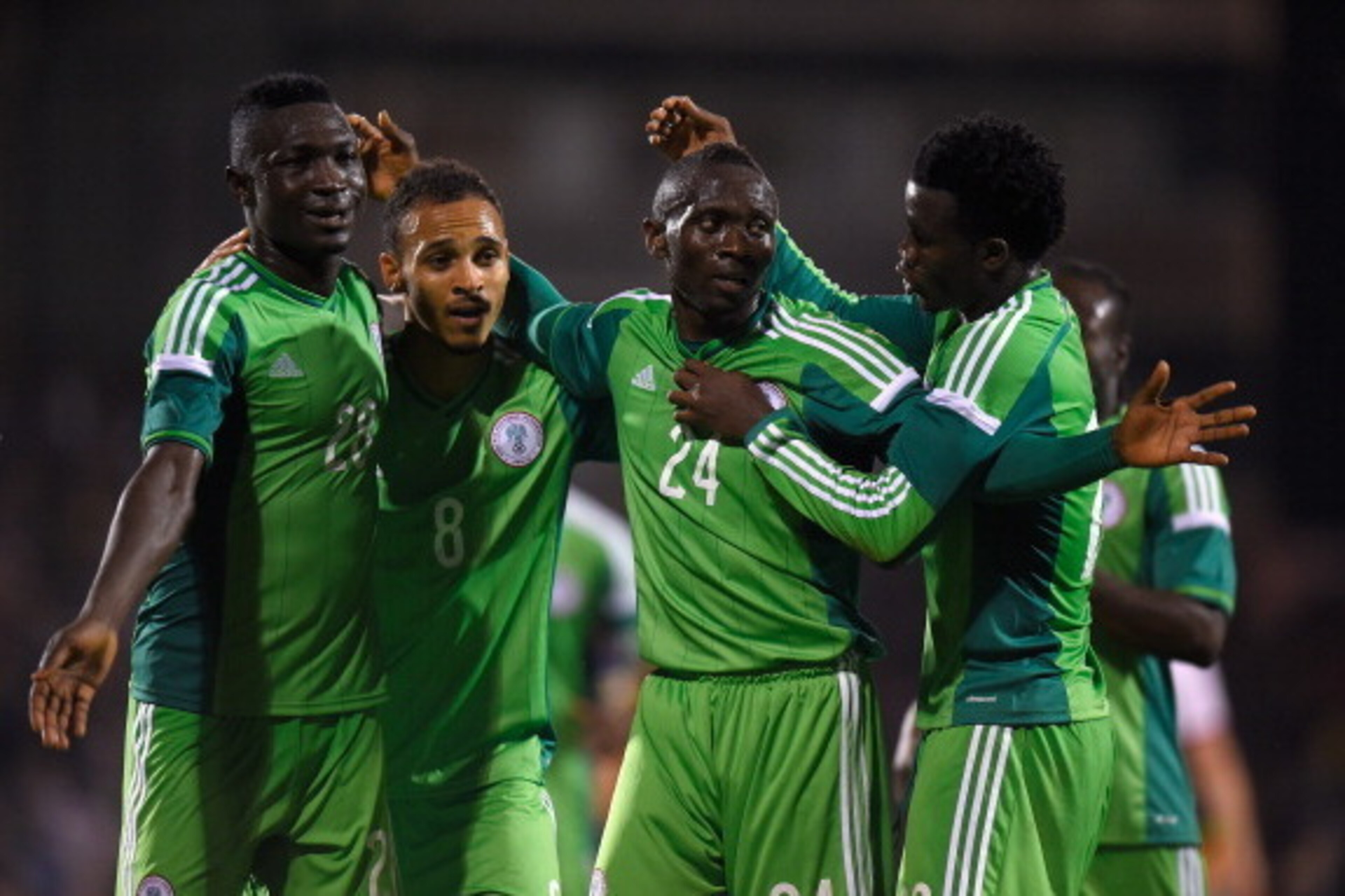 LONDON, ENGLAND - MAY 28:  Uche Nwofor of Nigeria (2nd R) celebrates with team mates after equalising in the last minute during an International Friendly between Scotland and Nigeria at Craven Cottage on May 28, 2014 in London, United Kingdom.  (Photo by 