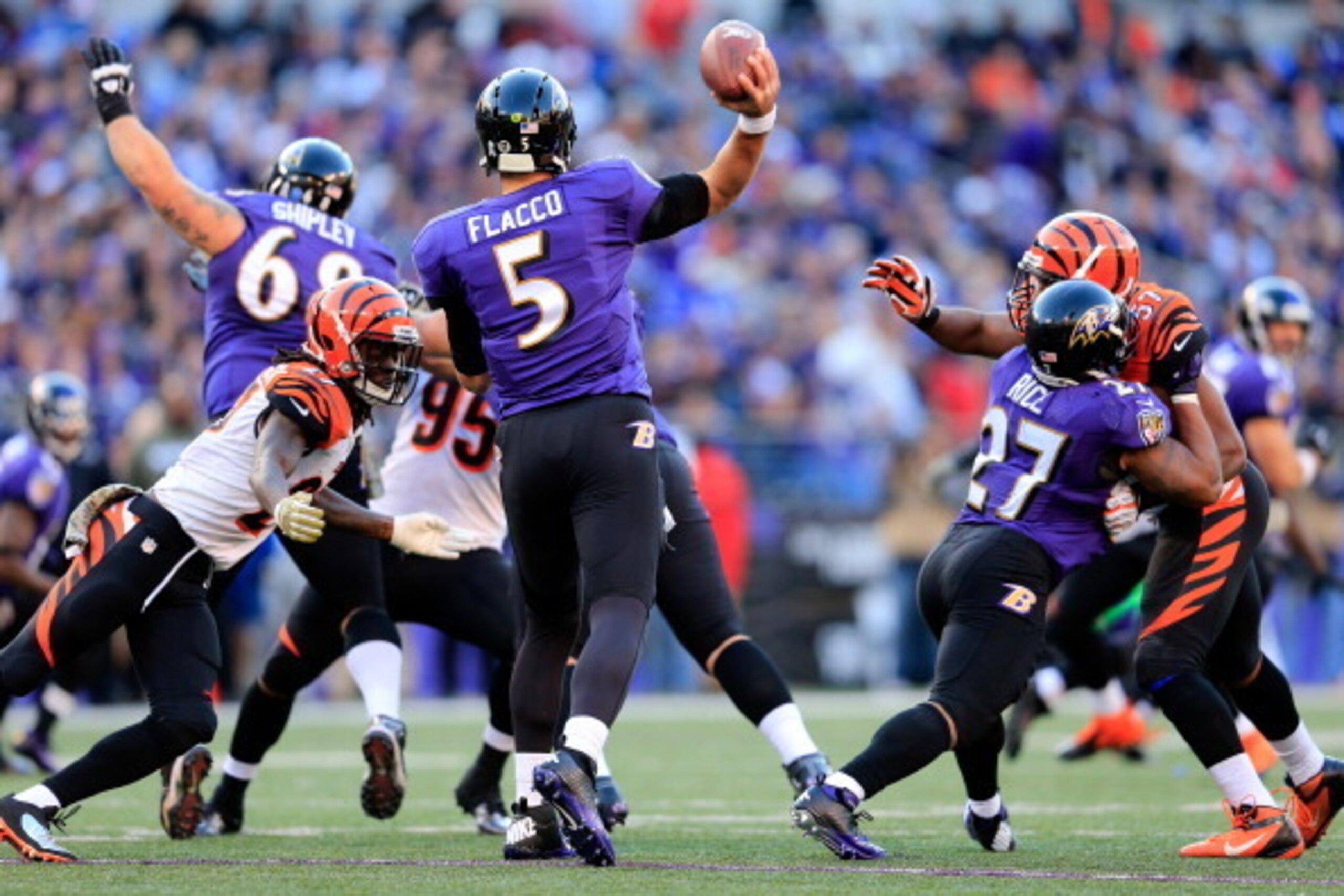 BALTIMORE, MD - NOVEMBER 10:  Quarterback Joe Flacco #5 of the Baltimore Ravens throws a pass against the Cincinnati Bengals at M&T Bank Stadium on November 10, 2013 in Baltimore, Maryland.  (Photo by Rob Carr/Getty Images)