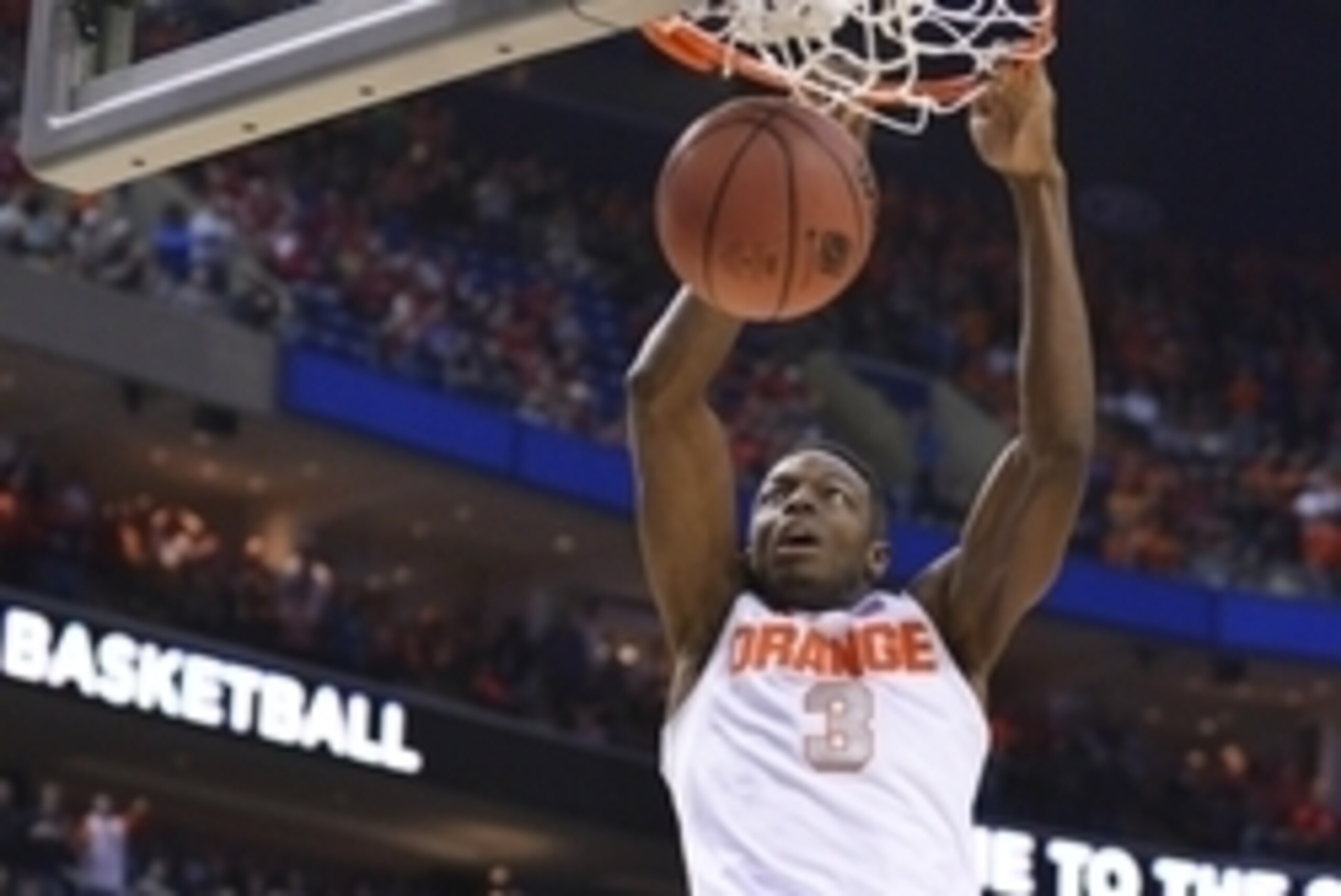 Mar 20, 2014; Buffalo, NY, USA; Syracuse Orange forward Jerami Grant (3) dunks past Western Michigan Broncos center Shayne Whittington (21)  in the first half of a men's college basketball game during the second round of the 2014 NCAA Tournament at First 