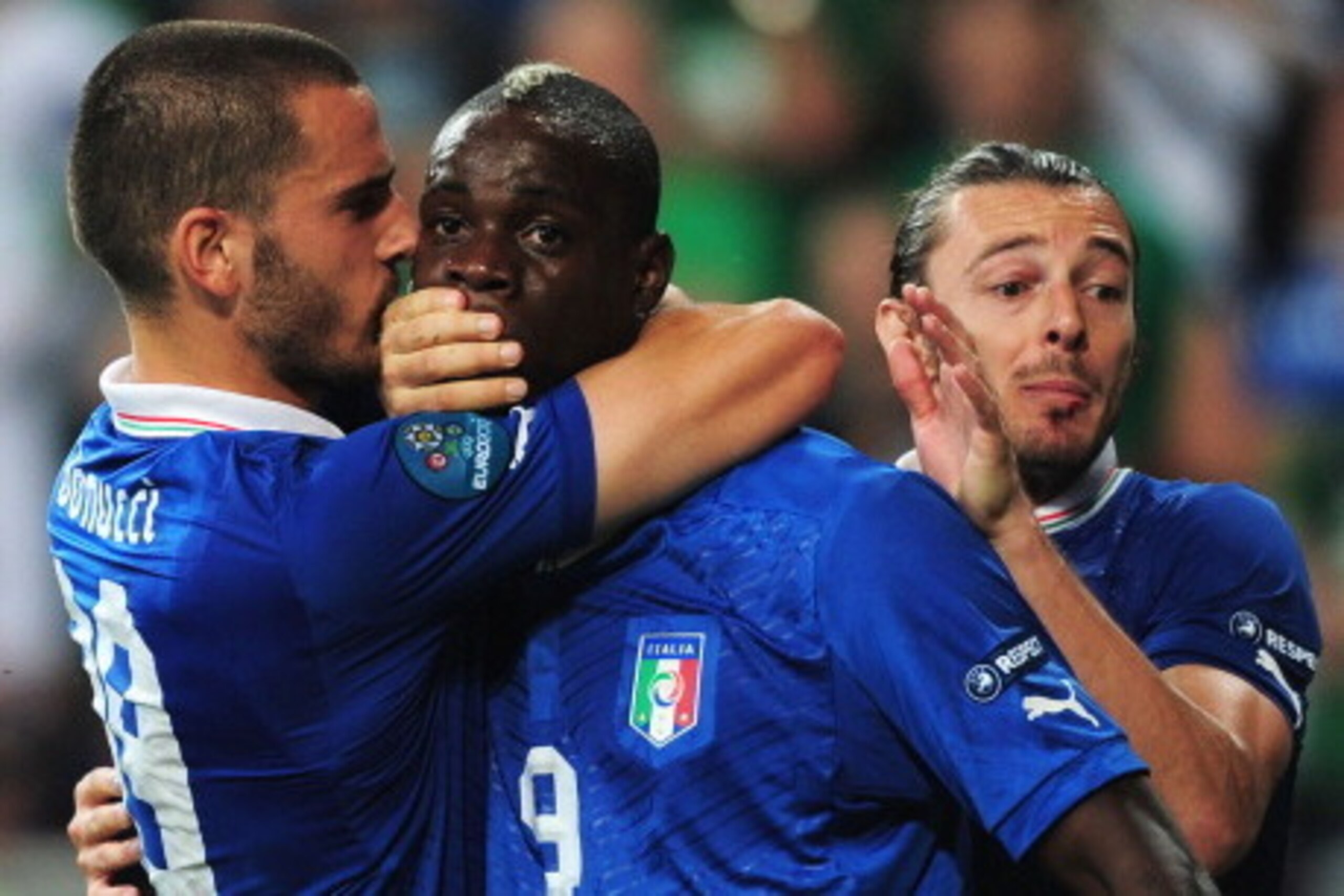 POZNAN, POLAND - JUNE 18:  Leonardo Bonucci of Italy covers Mario Balotelli's mouth after he scores his side's second goal during the UEFA EURO 2012 group C match between Italy and Ireland at The Municipal Stadium on June 18, 2012 in Poznan, Poland.  (Pho