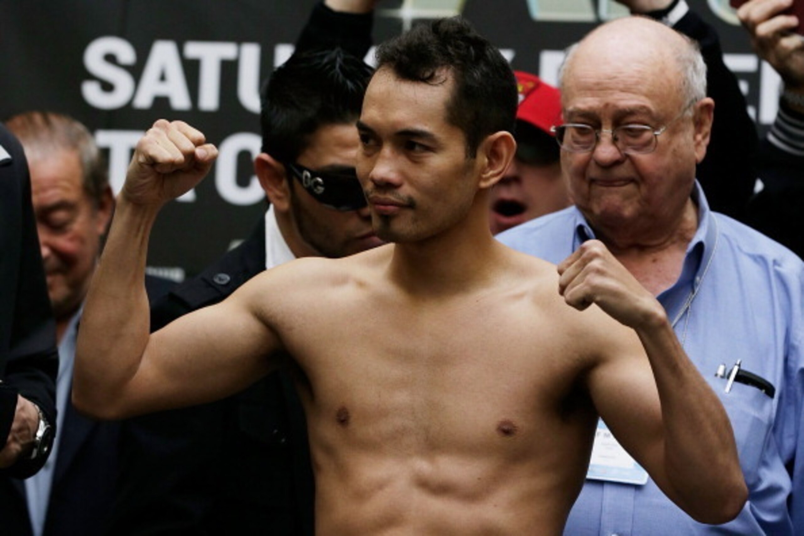 HOUSTON, TX - DECEMBER 14:  Nonito Donaire of the Philippines poses on stage at his official weigh-in at PlazAmericas Mall  a day prior to his fight with Jorge Arce of Mexico on December 14, 2012 in Houston, Texas.  (Photo by Scott Halleran/Getty Images)